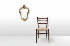 Belgian 20th Century gold framed oval mirror in Louis XV style