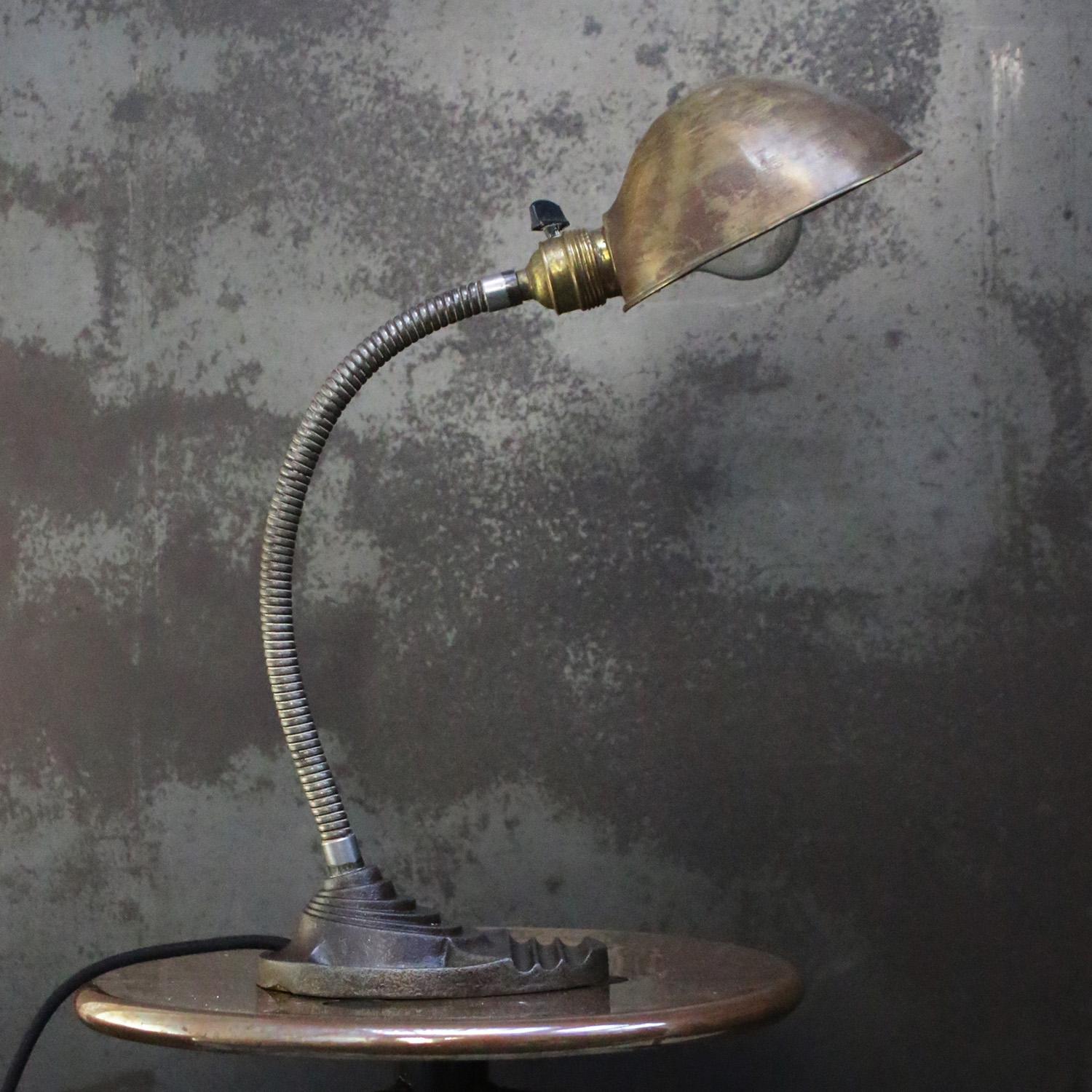 Belgian goose neck desk light by Erpe Belgium
flexible arm with brass shade.
Cast iron base. Black cotton wire and plug.

Available with US/UK plug

Weight: 1.50 kg / 3.3 lb

Priced per individual item. All lamps have been made suitable by