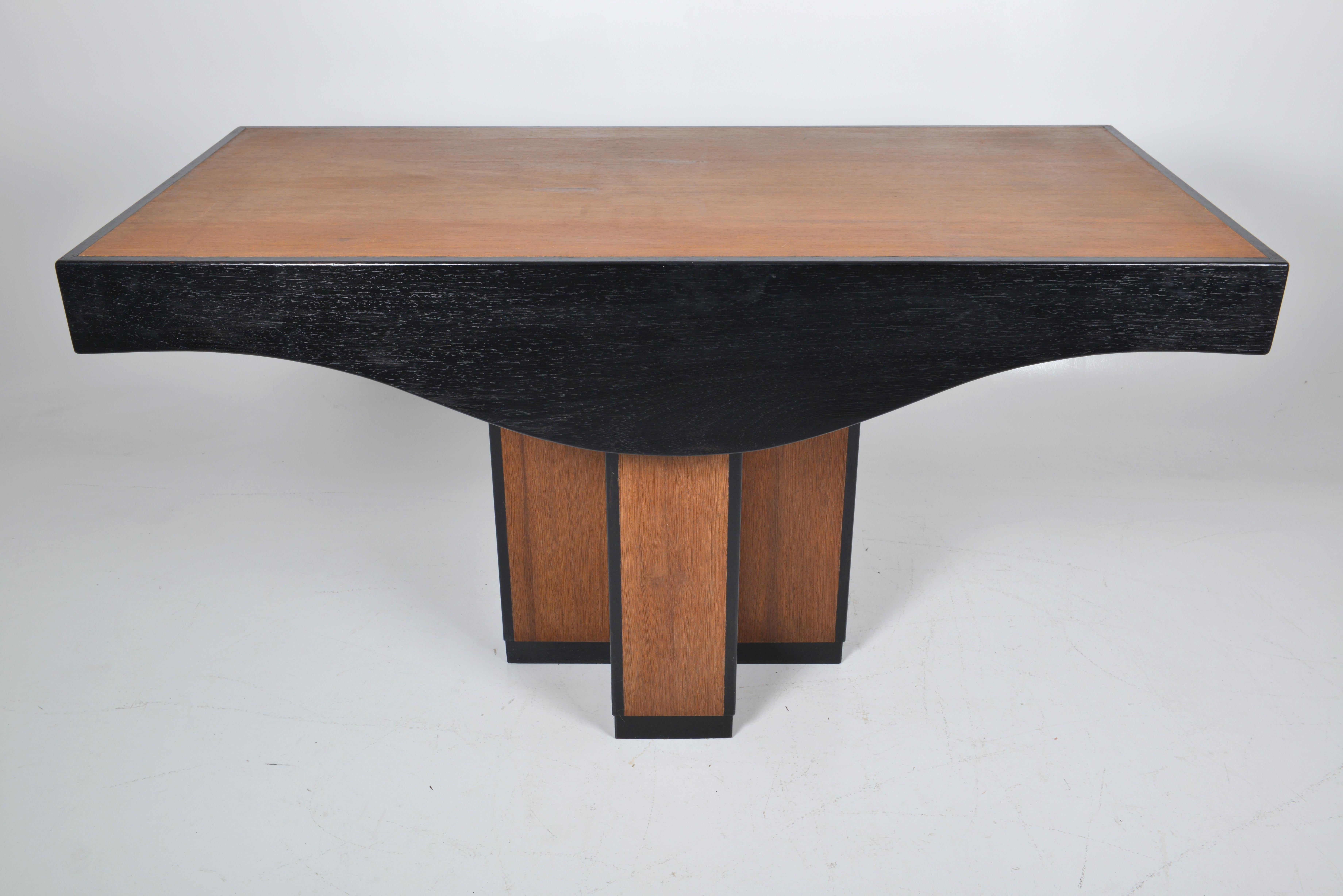 Belgian 1930s oak and ebonized oak finish center table
Unique and unusual center or console table. Made of oak in Belgium in the 1930s. Some parts are ebonized and give the table a strong architectural look, a very recognizable piece of furniture,