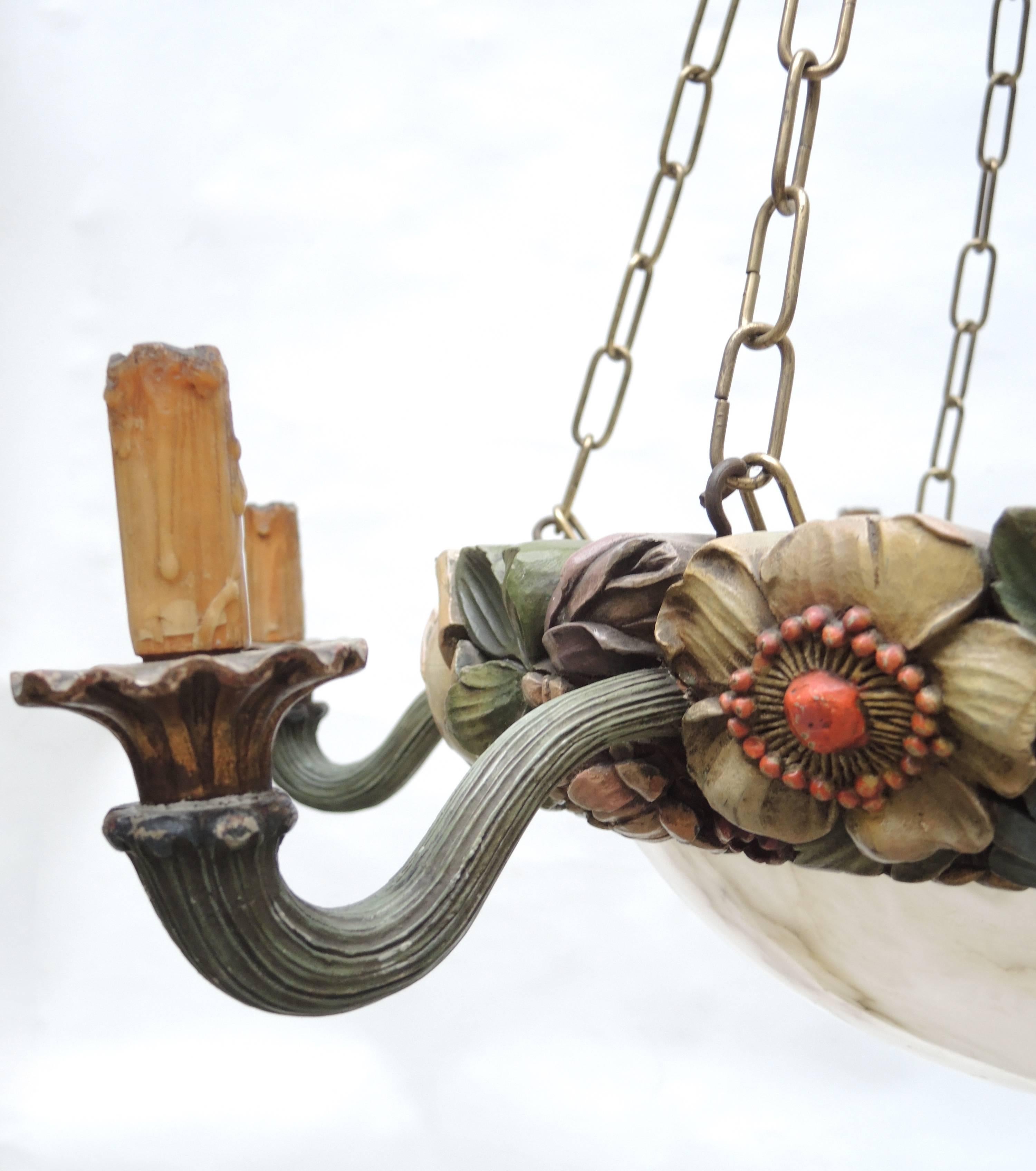 Large period, 1880 Art Nouveau chandelier. Beautifully executed hand carved wood retains all the original paint in excellent condition. Large Alabaster stone bowl with interior sockets provide a theatrical glow that adds to the sculptural excellence