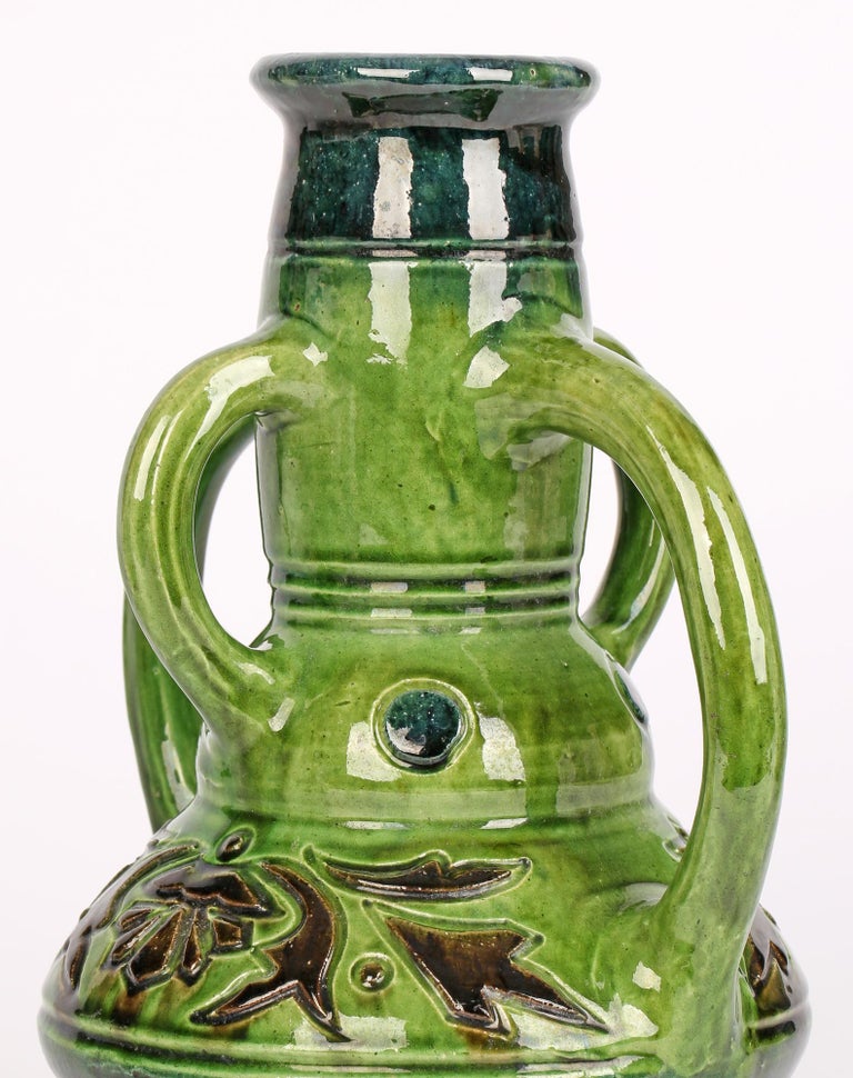 https://a.1stdibscdn.com/belgian-art-nouveau-four-handled-green-glazed-art-pottery-vase-for-sale-picture-3/f_13282/f_291145121655234023948/i04_master.jpg?width=768