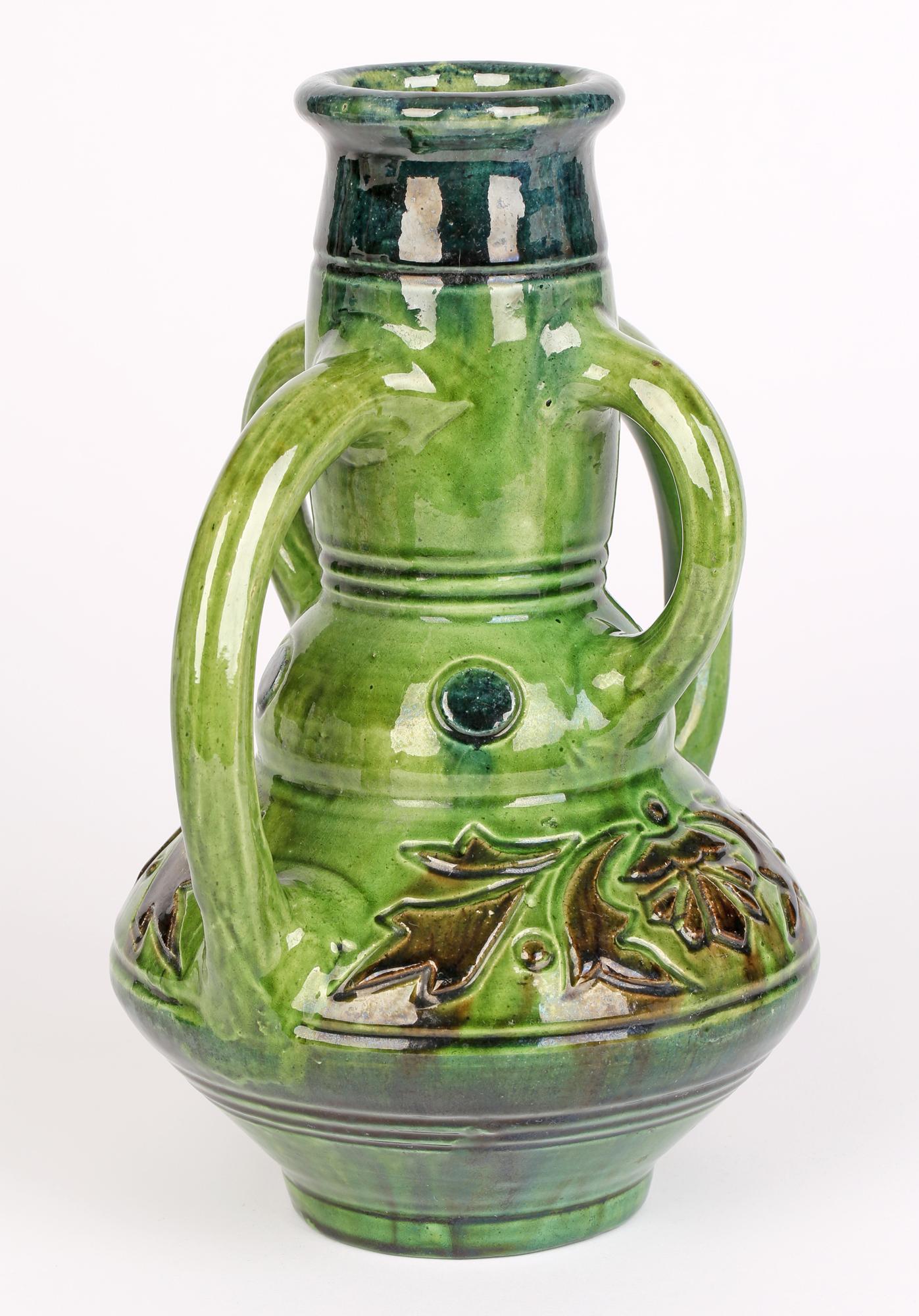 Early 20th Century Belgian Art Nouveau Four Handled Green Glazed Art Pottery Vase For Sale