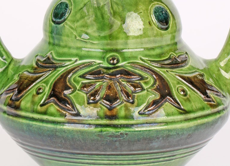 https://a.1stdibscdn.com/belgian-art-nouveau-four-handled-green-glazed-art-pottery-vase-for-sale-picture-8/f_13282/f_291145121655234027061/i09_master.jpg?width=768