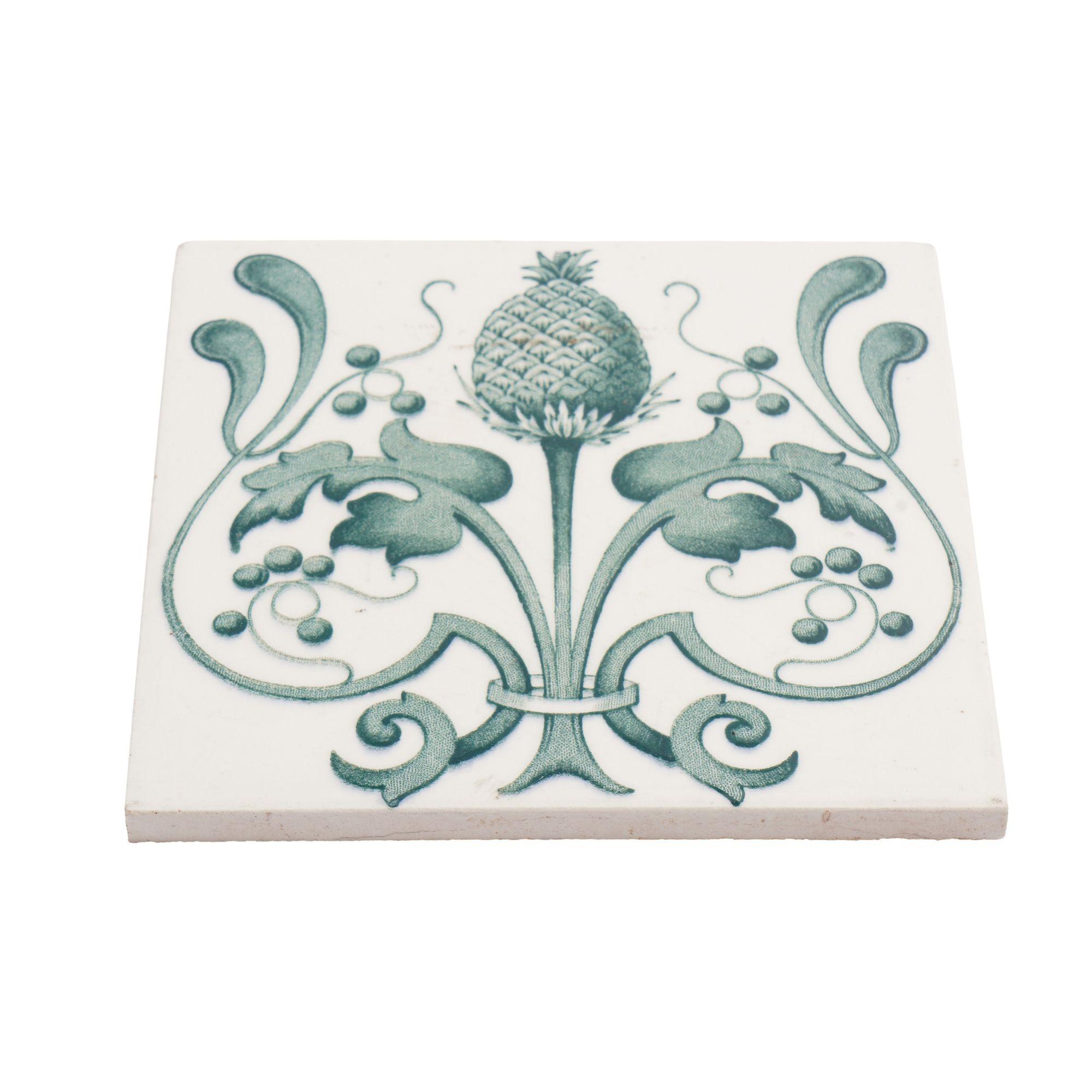 A unique and handmade Art Nouveau tile with an intricate and symmetrical floral pattern. Removable felt pads have been affixed to the back for use as a trivet or large coaster.

Marked on the reverse: MS
Belgium, circa 1920.