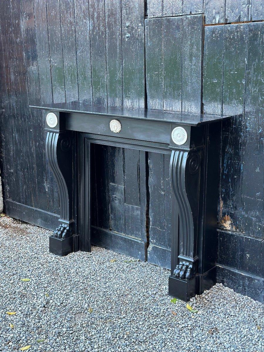 Charles X Belgian Black Marble Fireplace And Statuary White Mascarons, 19th Century For Sale