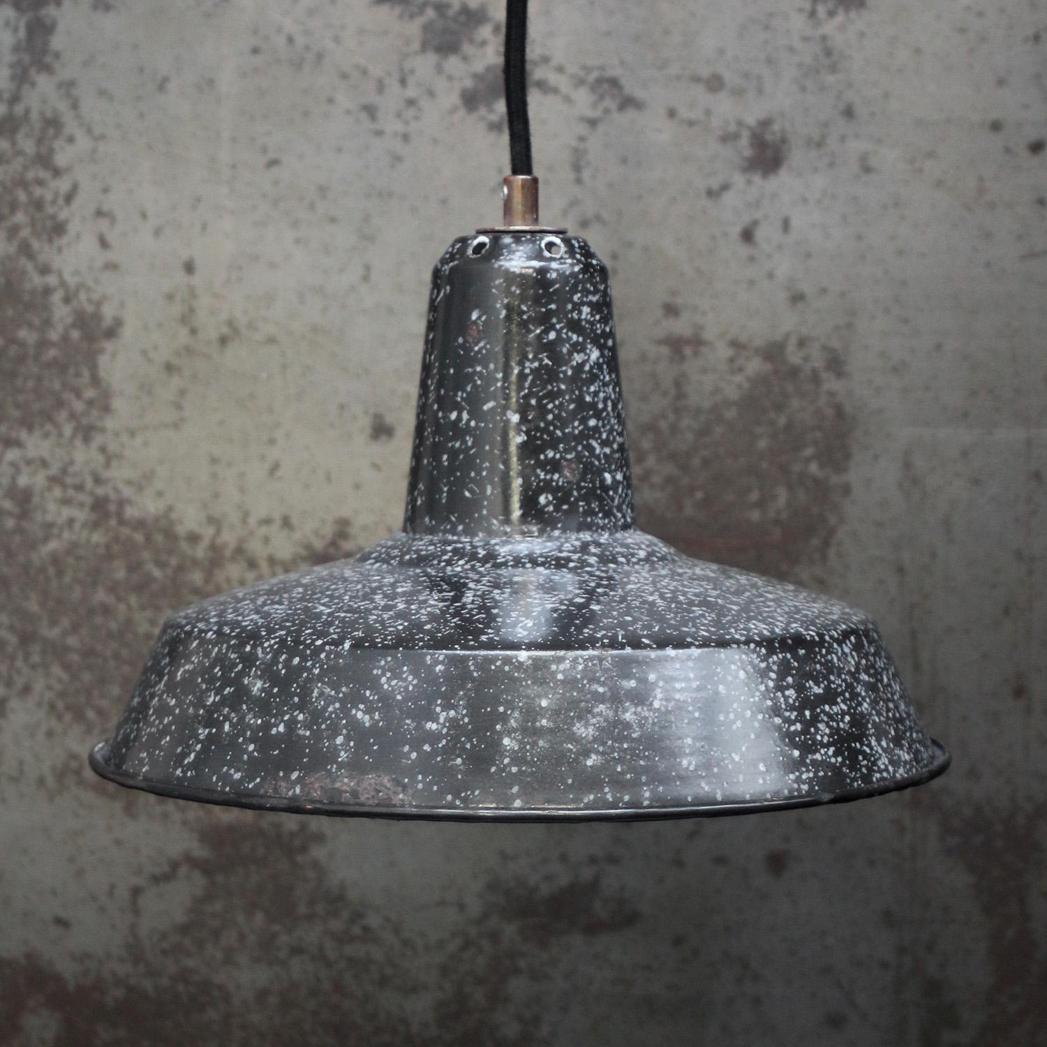 Belgian industrial hanging lamp
black and white speckled enamel white interior

Weight: 1.00 kg / 2.2 lb

Priced per individual item. All lamps have been made suitable by international standards for incandescent light bulbs, energy-efficient and LED