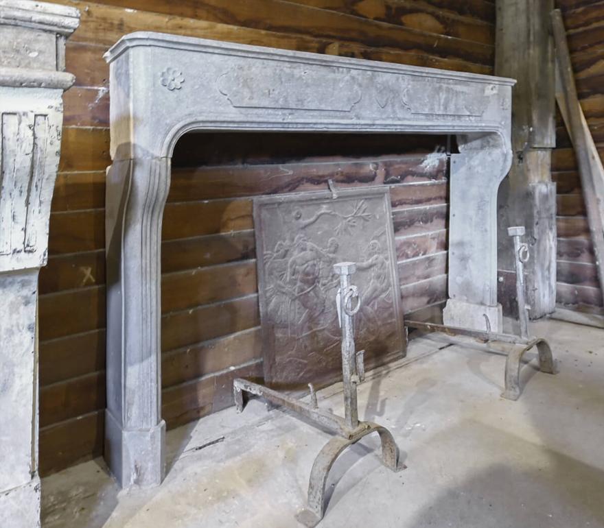 Beautfiul and rare fireplace mantel from the 18th century made
out of Belgian bluestone. Recuperated out of a mansion
near Paris, France.
Fireplace to place in front of the chimney.