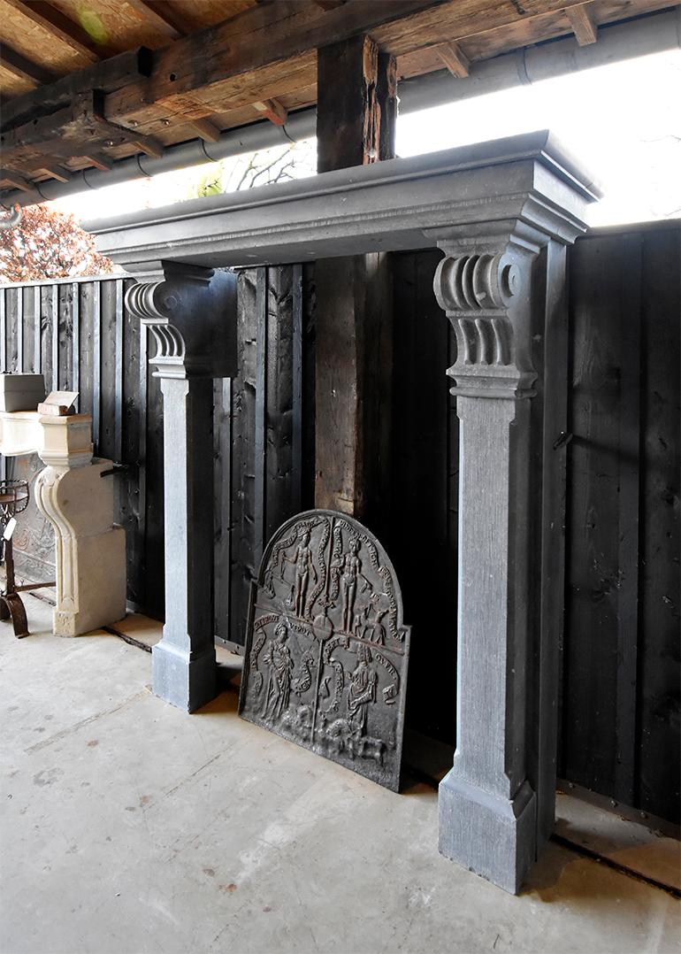 A beautiful antique Belgian bluestone fireplace from the 19th century.
Recuperated from a mansion near Brussels in Belgium.