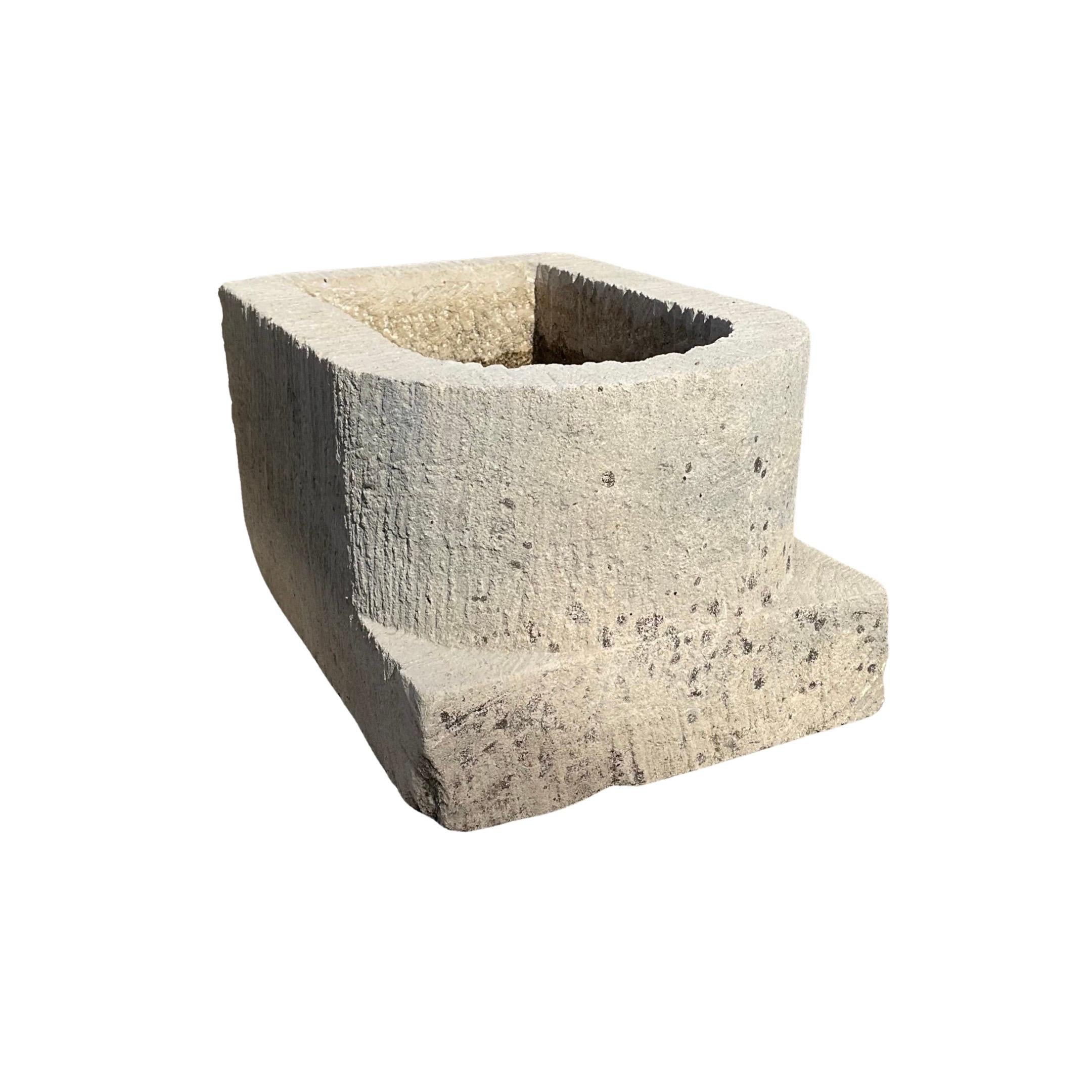 This small-sized Belgian Bluestone Planter features a Norman Window shape, crafted from authentic 18th century bluestone imported from Belgium. Enhance your garden with this unique and historic piece that adds a touch of European charm.
