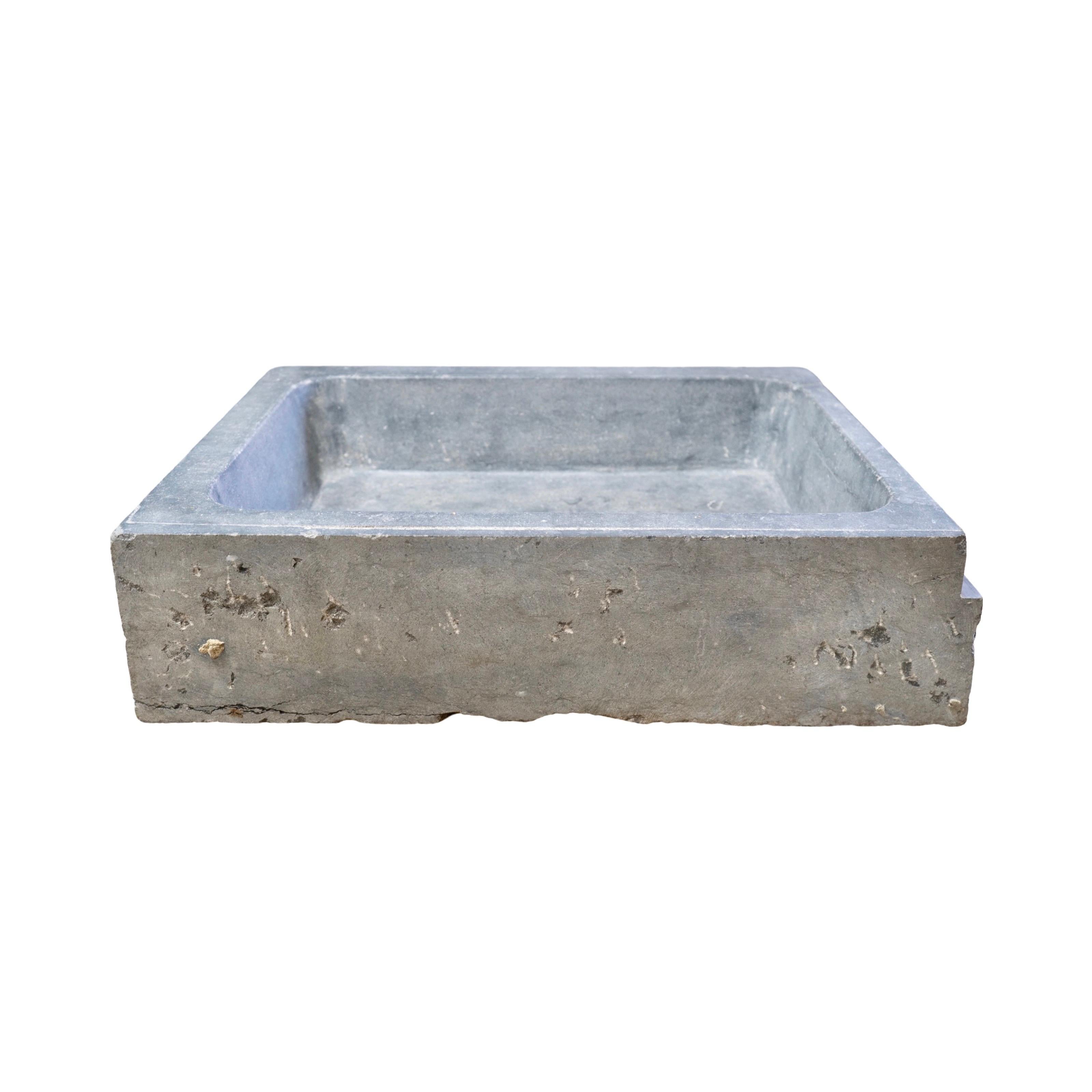 The Belgian Bluestone Sink, made from authentic bluestone sourced from Belgium in the early 1900s, is a unique and timeless addition to any bathroom. Its sturdy rectangular shape and pre-drilled drainage hole provide both aesthetic and functional