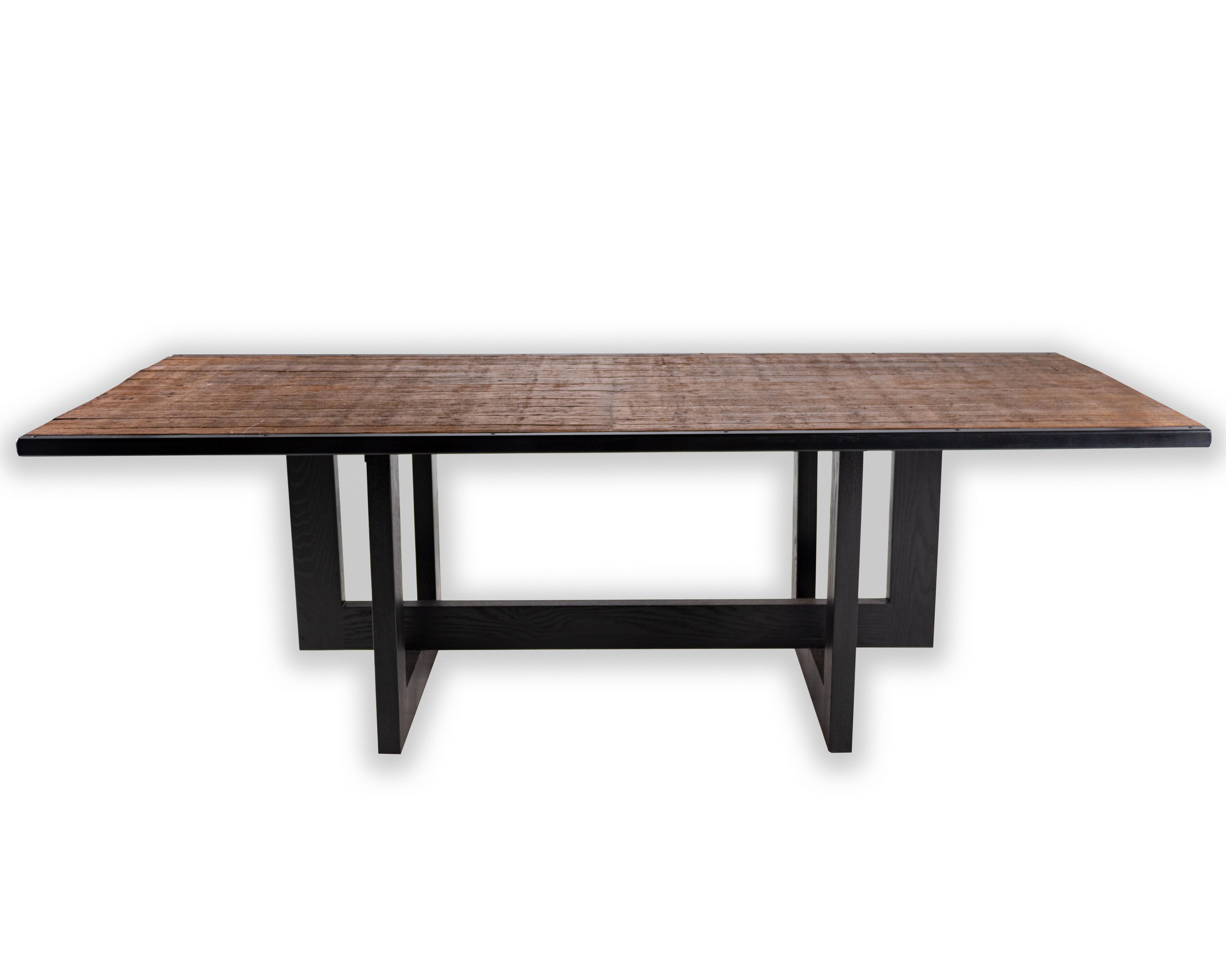 Belgian Brick baking pallet dining table, with a patinated geometric ebony base.

Designed by Brendan Bass for the Vision and Design Collection, by using high quality materials and textures. All materials are sourced from local vendors throughout