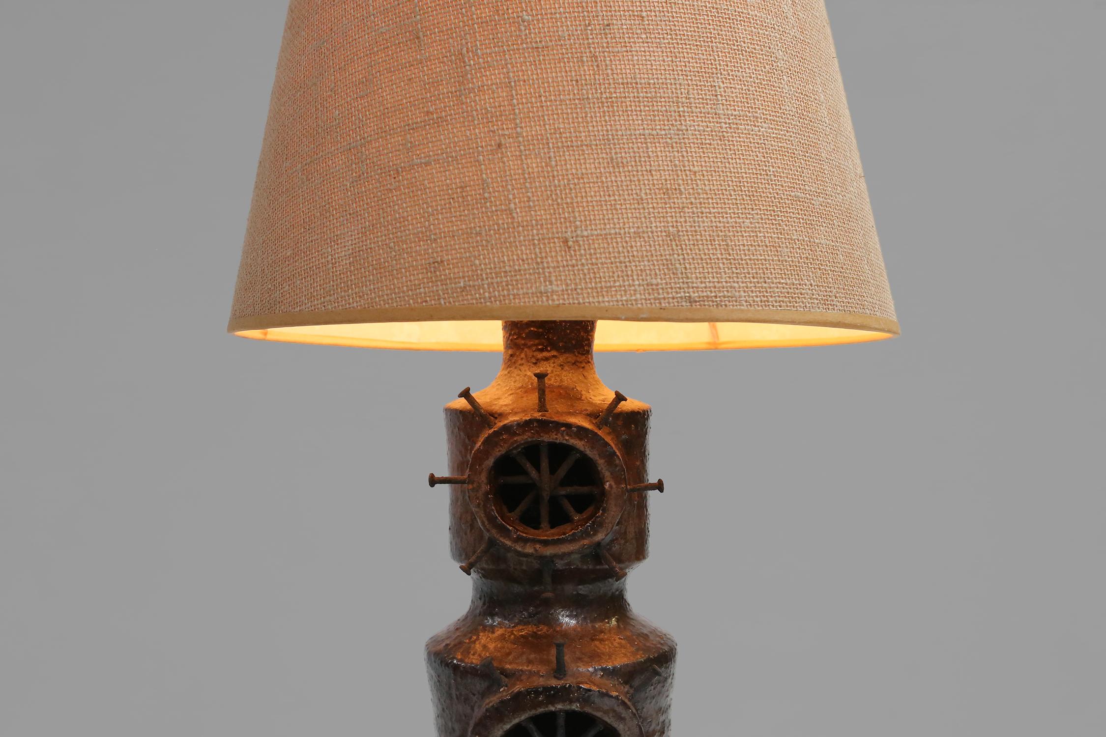 Belgian brutalist lamp made of ceramic and nails made in the 1960s.
