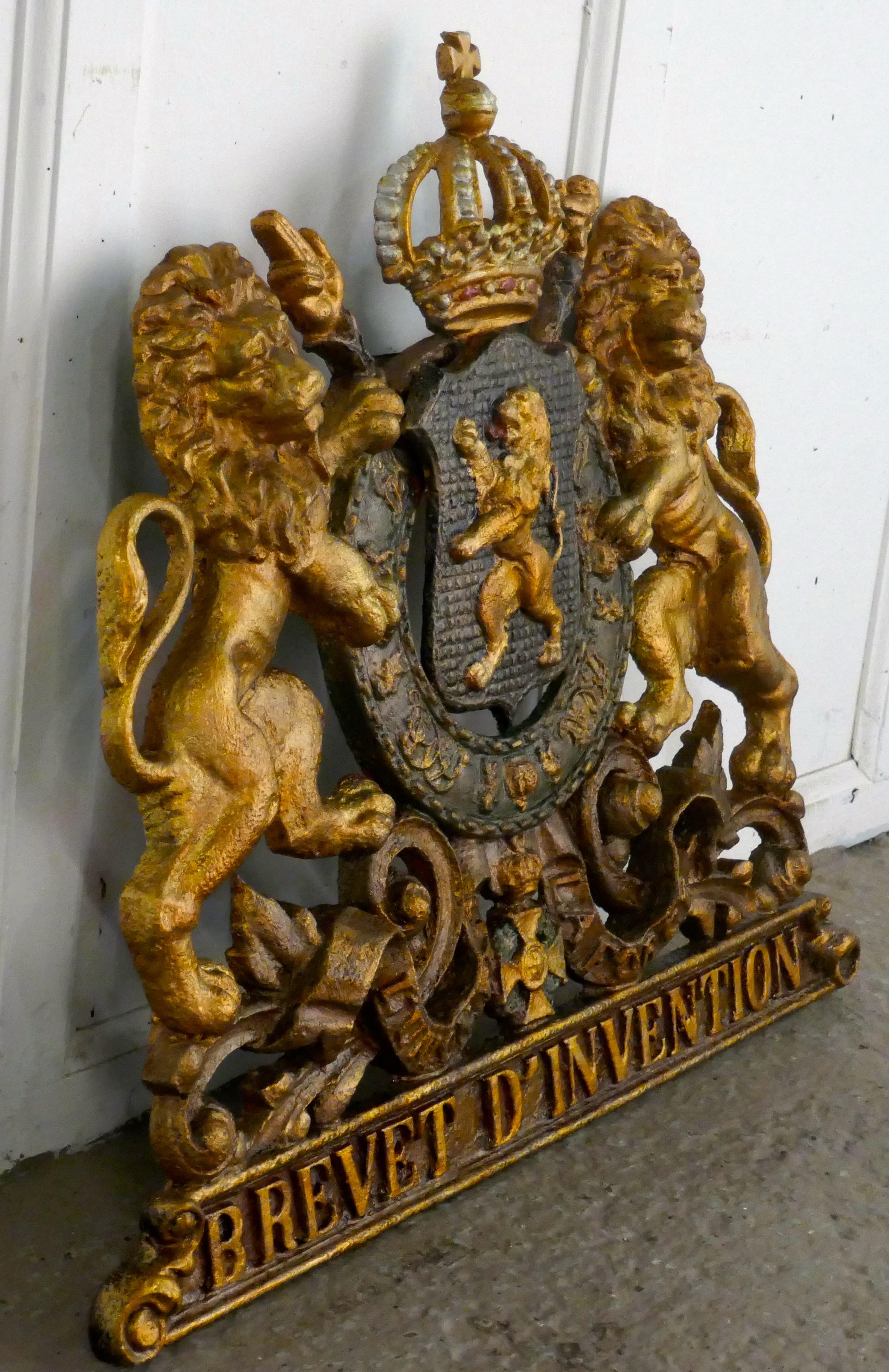 Belgian cast iron heraldic coat of arms shield

This coat armorial is very heavy piece, it is made cast in iron, it would originally have been wall hung by a large loop on the back
It has the Motto “L'union fait la force” (Unity Makes Strength)