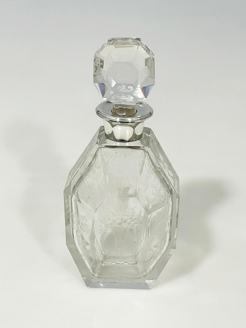 Belgian clear crystal cut carafe with silver by Altenloh, 1880-1890

A clear crystal cut carafe with silver collar. A Belgian carafe made by the famous Brussels goldsmith Altenloh, official supplier to the Belgian royal court since 1878. The carafe