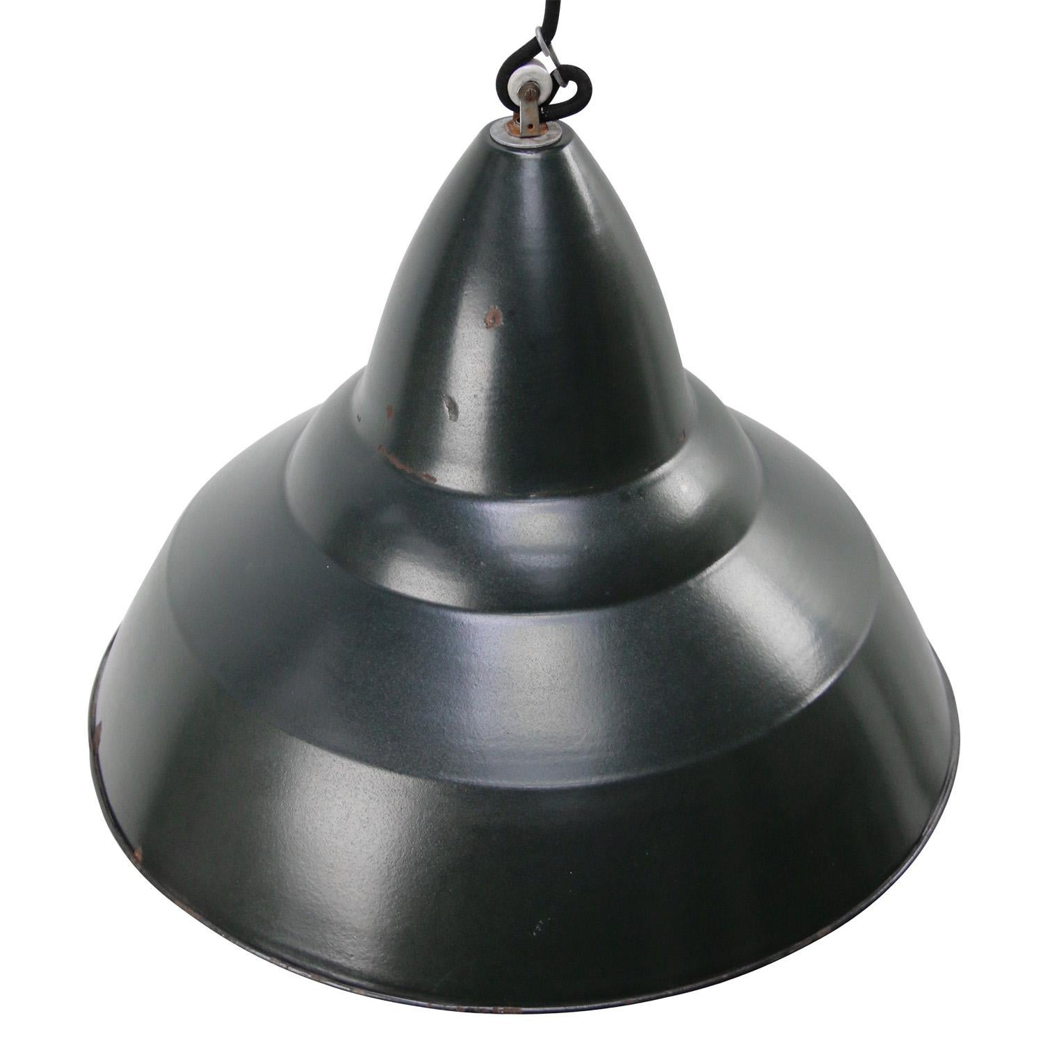 Belgian Industrial pendant lamps.
Green enamel, white inside

Weight: 1.90 kg / 4.2 lb

Priced per individual item. All lamps have been made suitable by international standards for incandescent light bulbs, energy-efficient and LED bulbs.