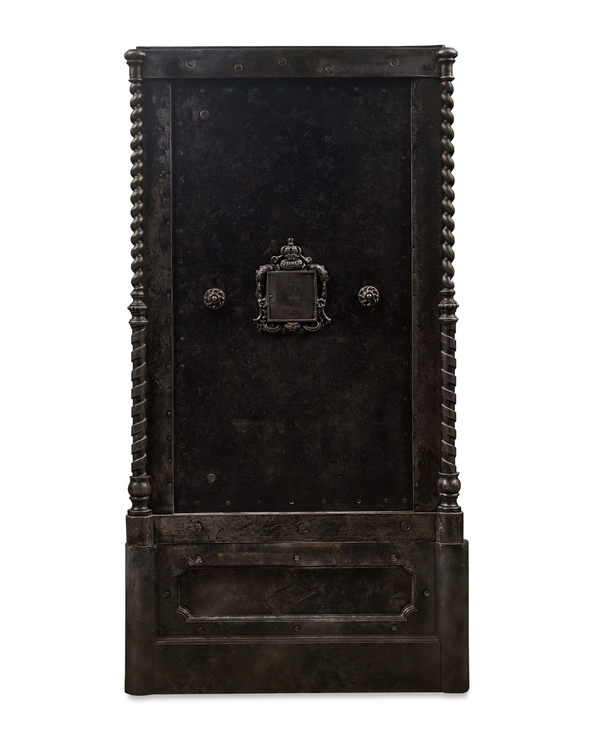 This Belgian cast-iron safe represents an important precursor to the modern combination lock. The 19th-century safe features a state-of-the-art hidden lock mechanism that is additionally secured by a four-letter combination code. A hidden key opens