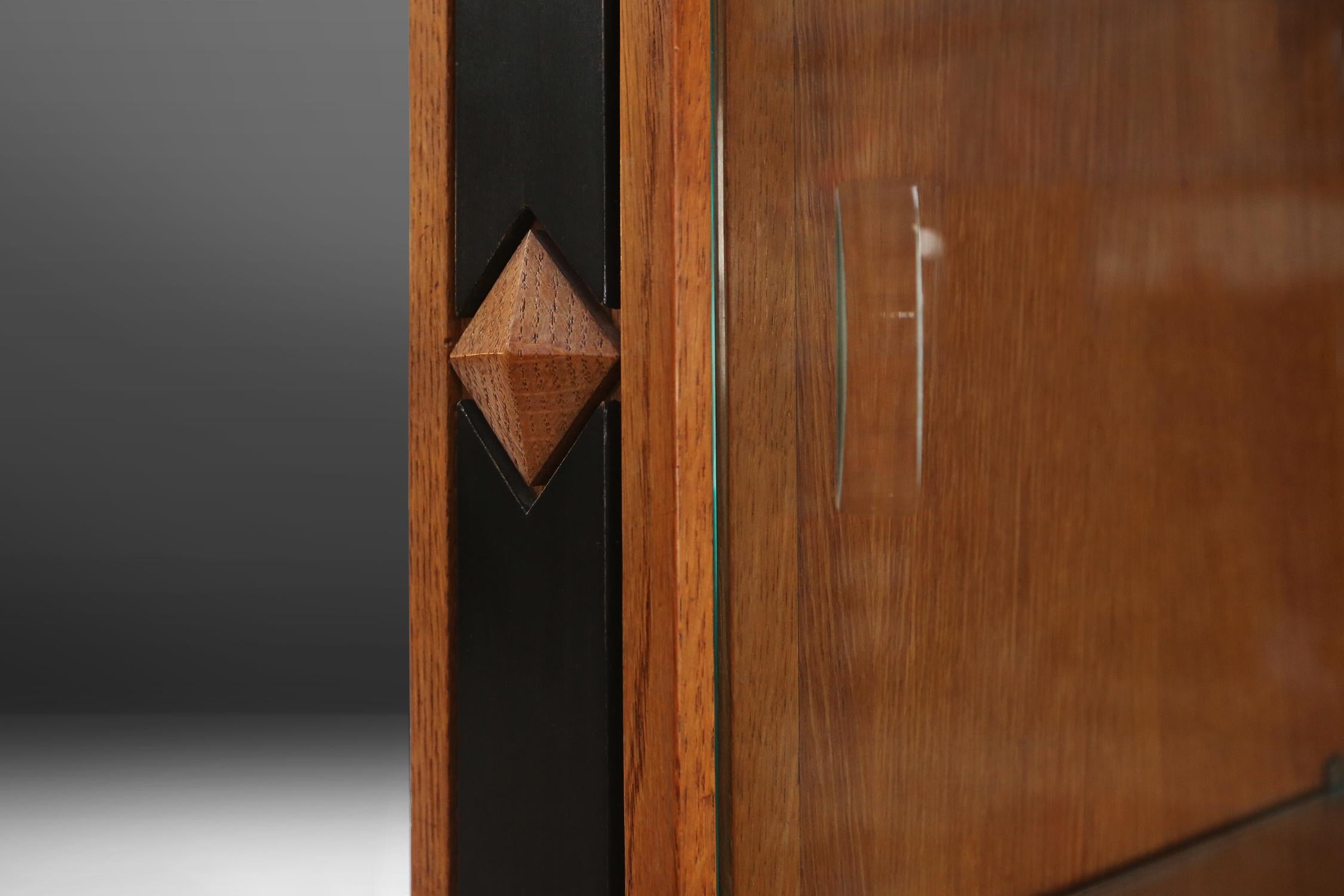 Glass Belgian late Art Deco cabinet in solid oak For Sale