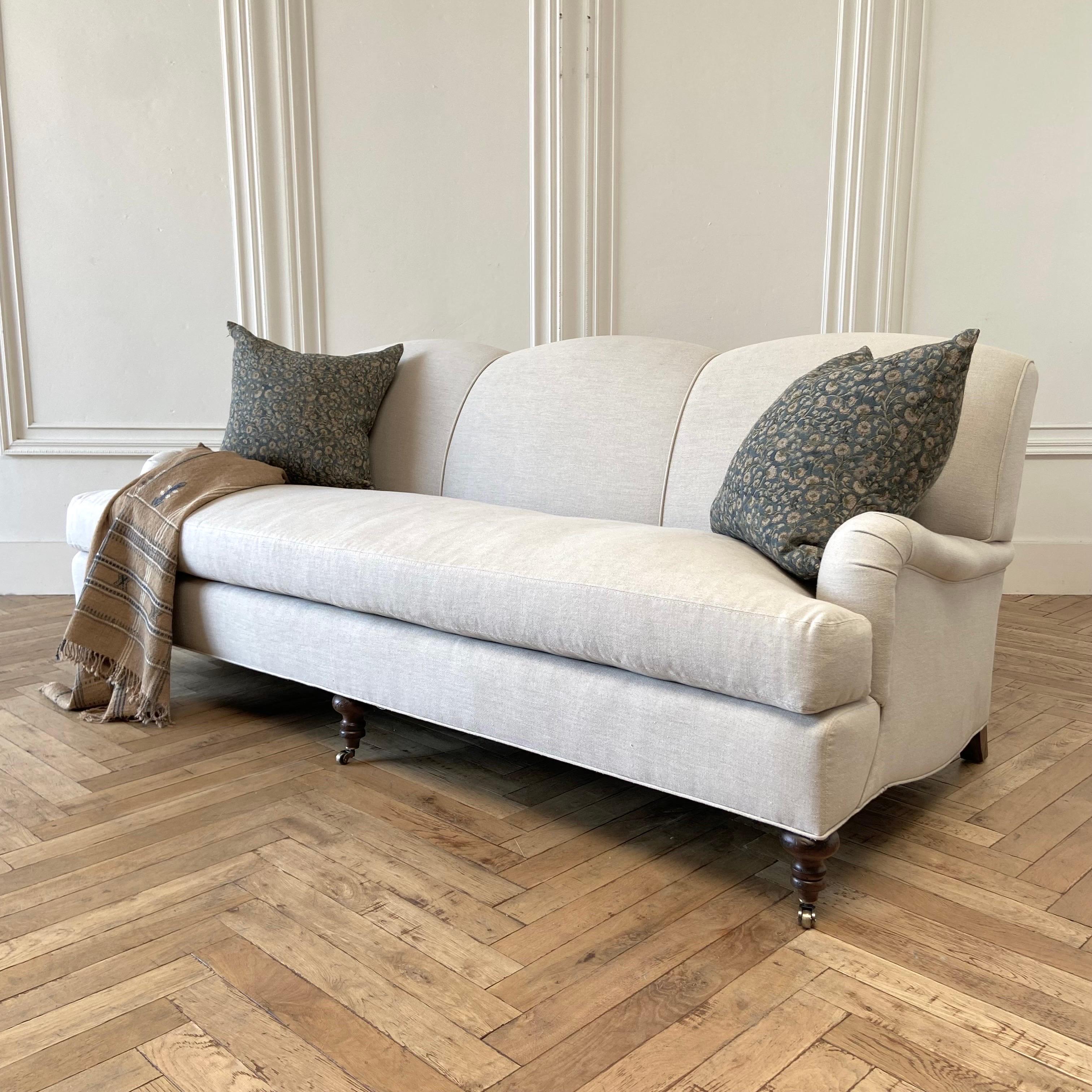 Custom made for Bloom Home Inc, this beautiful english arm sofa is upholstered in a natural Belgian Linen, with down cloud cushions.
Hardwood frame, no sag, HR foam, cotton, and poly fill. Hand-crafted in the USA
Espresso legs, and brass