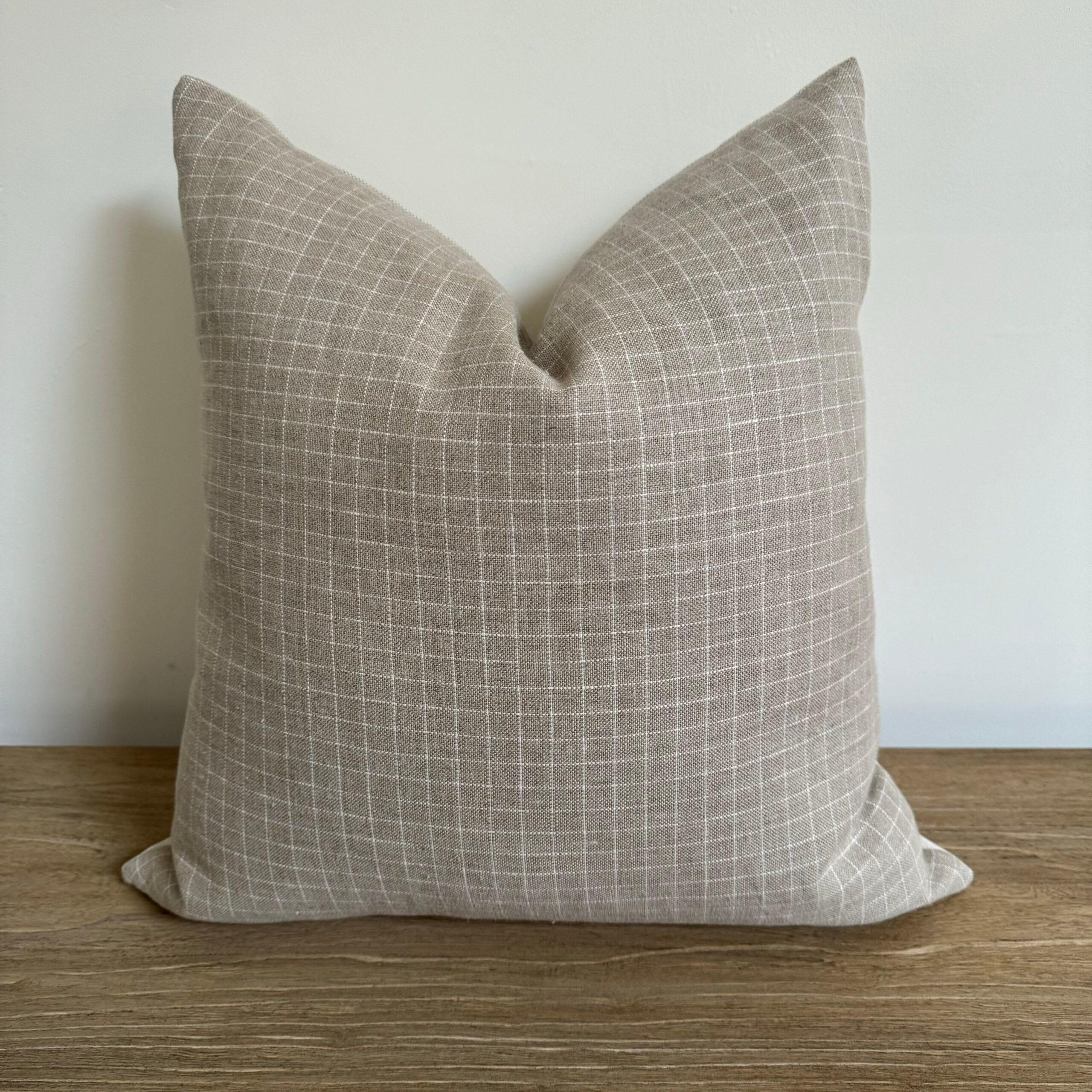 A luxurious heavy woven linen plaid face with stone washed linen back.
Linen fabric is imported from France.
Custom made to order, can be customized to your size.
Color: Blanc / Oyster / Natural
Antique brass zipper
Size 20x20
Includes Down Feather