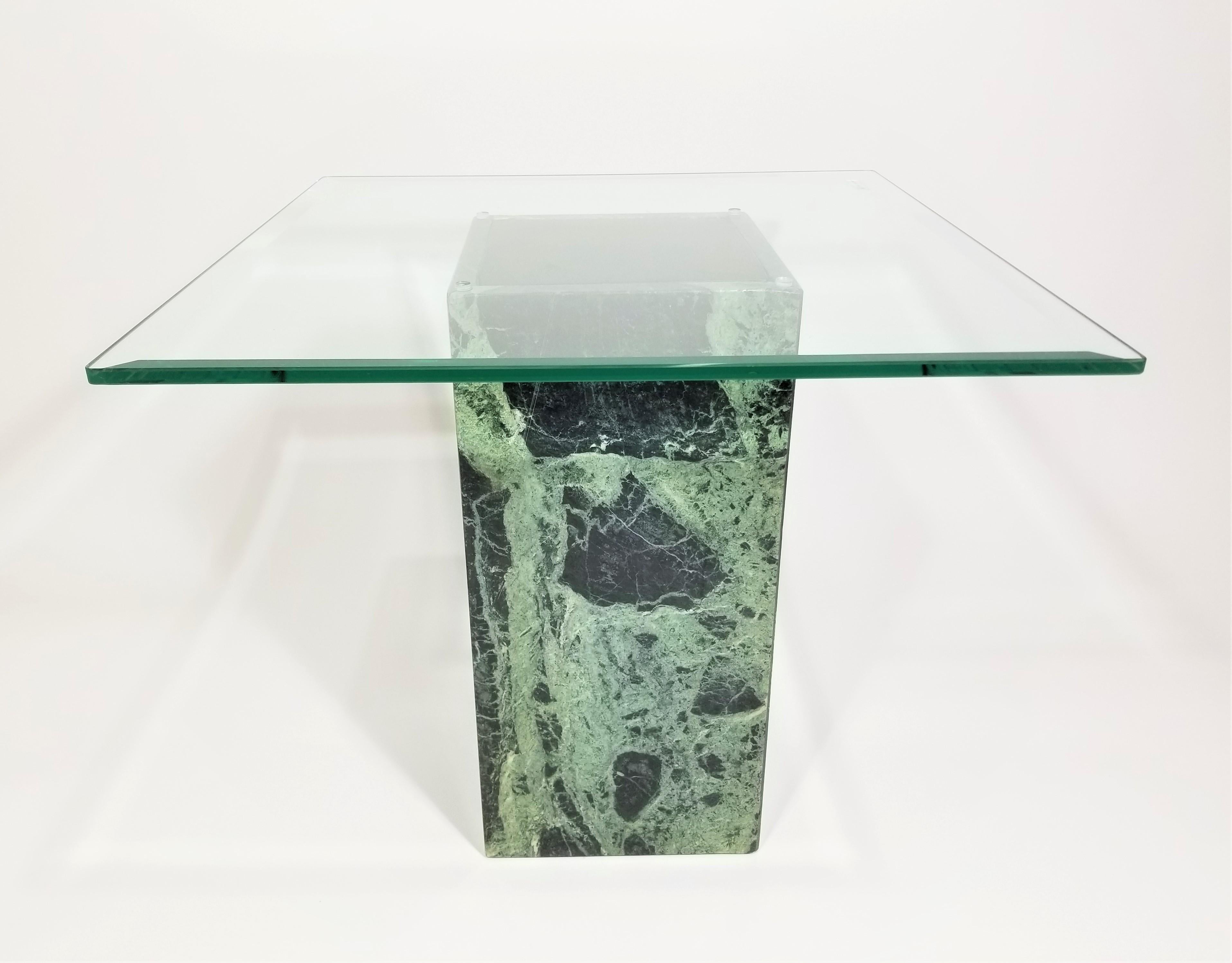 Mid century 1970s - 1980s green marble base with glass top end table or side table. Beautiful beveled substantial glass. Dark brown/ black leather on top of base. Glass top is in excellent condition. Marble base exhibits some minor wear consistent
