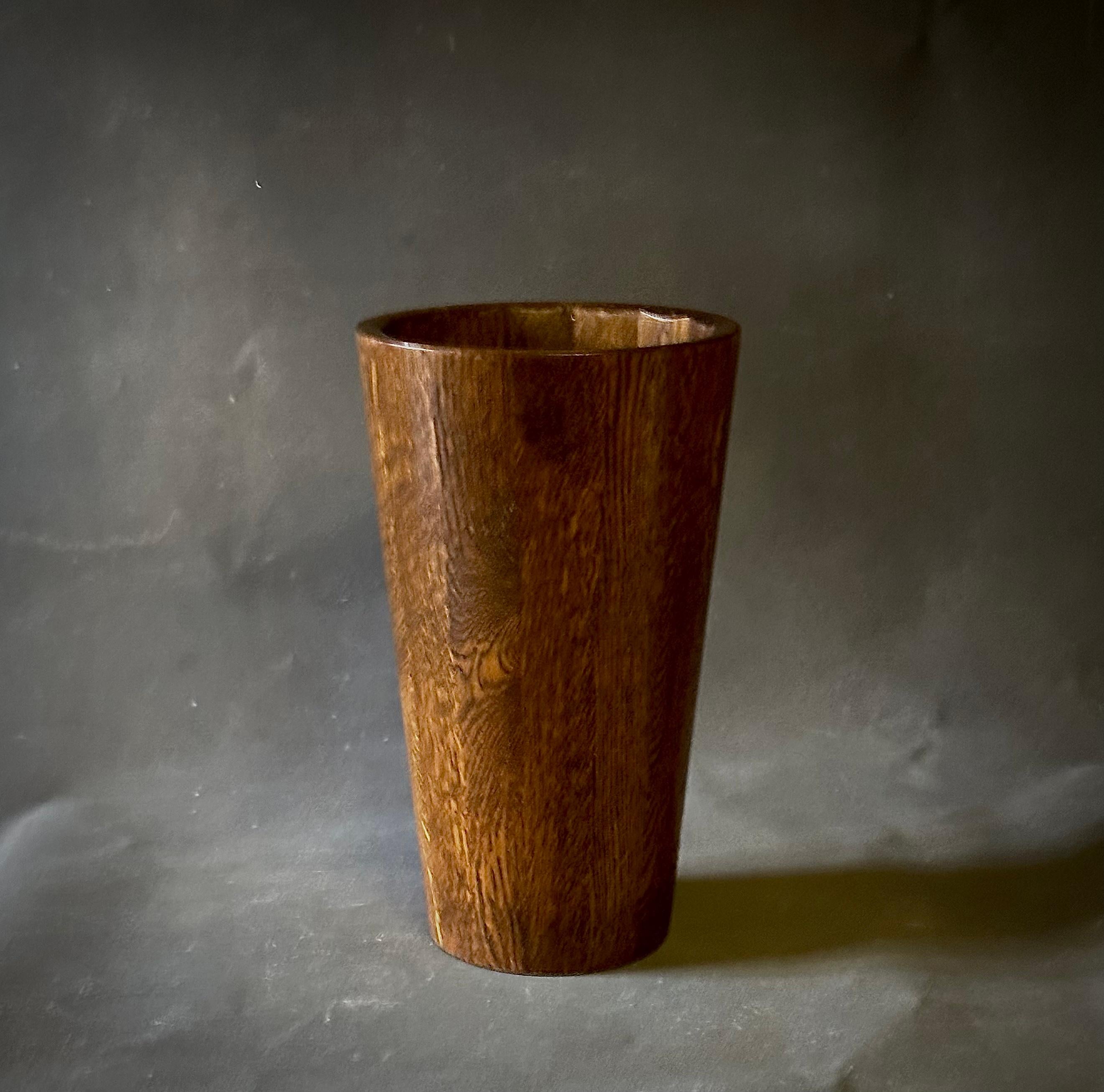 Belgian mid-century wooden umbrella stand or waste bin with a simple, cylindrical shape. Warm and understated.

Belgium, circa 1940.

Dimensions: 11 W x 11 D x 18 H.