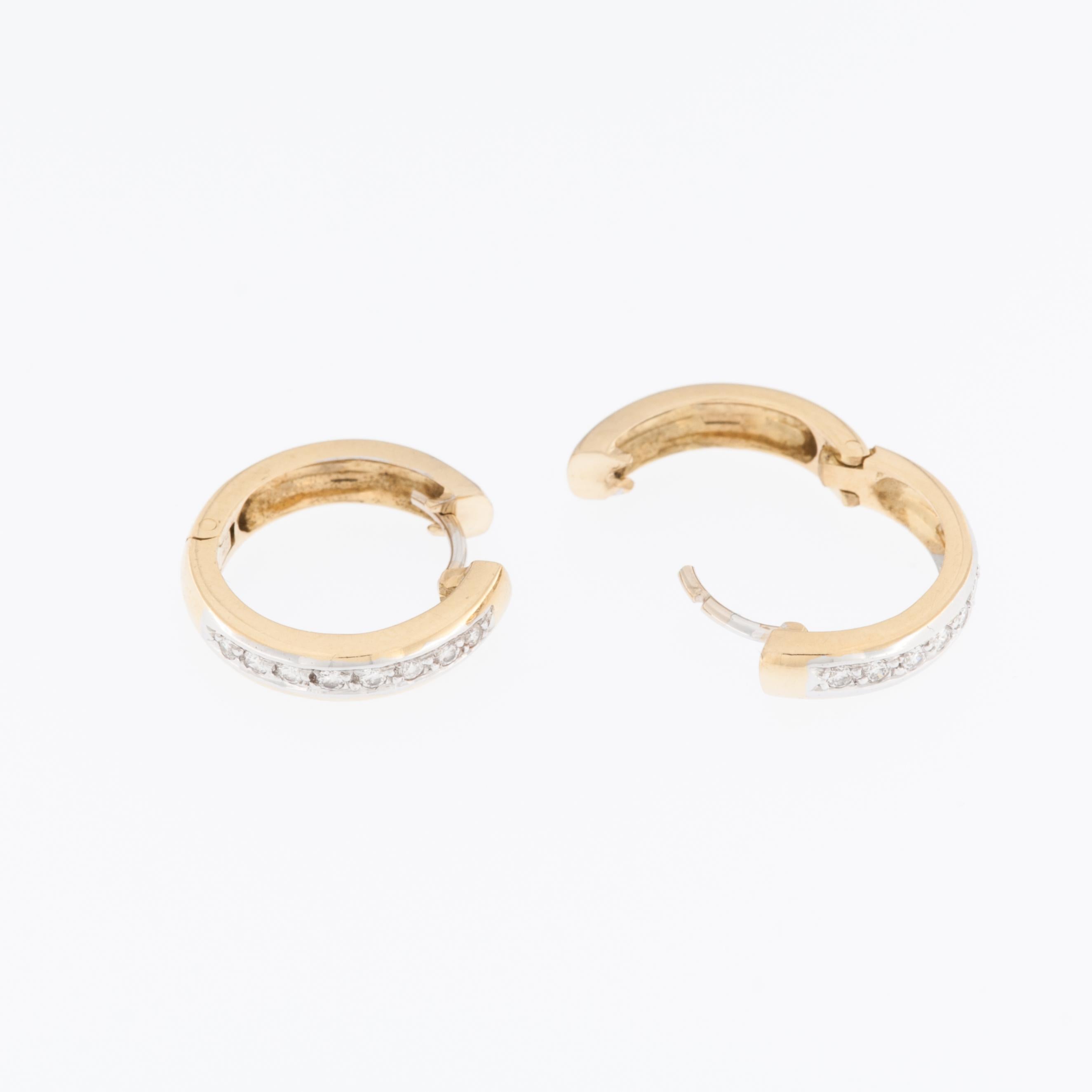 These Belgian Modern 18kt Yellow and White Gold Earrings with Diamonds are a stunning piece of jewelry that combines craftsmanship, elegance, and luxury. 

The earrings are crafted from high-quality 18-karat yellow and white gold, showcasing a