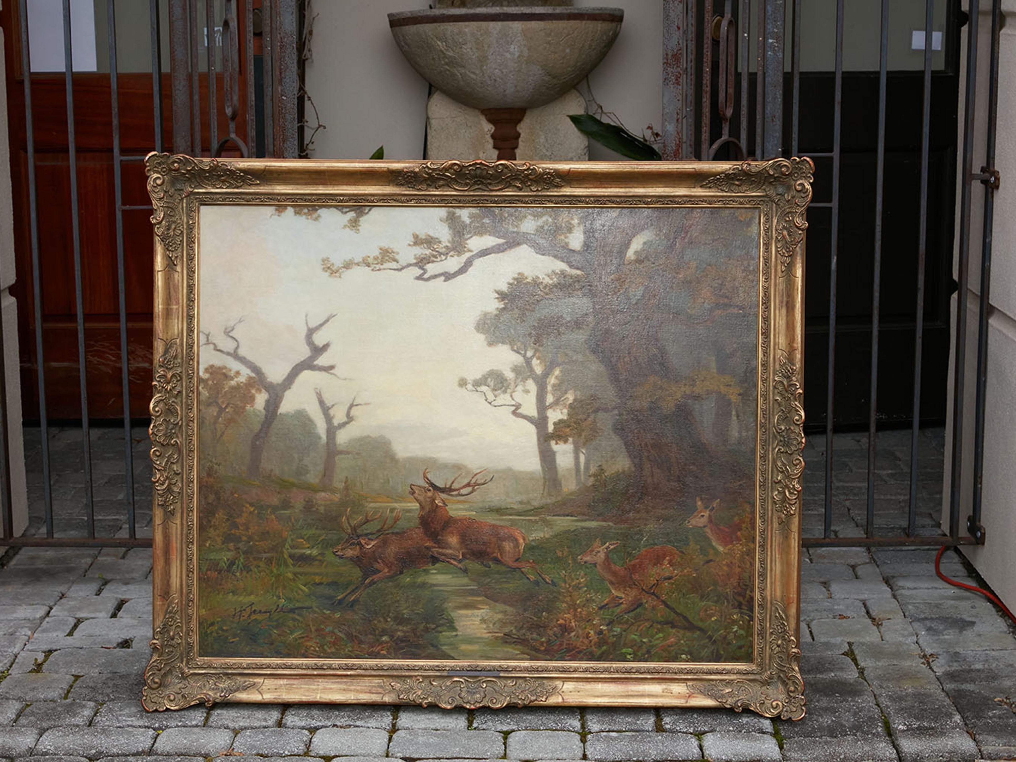 A Belgian oil on canvas painting from the early 20th century depicting a herd of deer running in the forest. Created in Belgium during the first half of the 20th century, this oil on canvas painting depicts a herd of deer exiting a forest.
