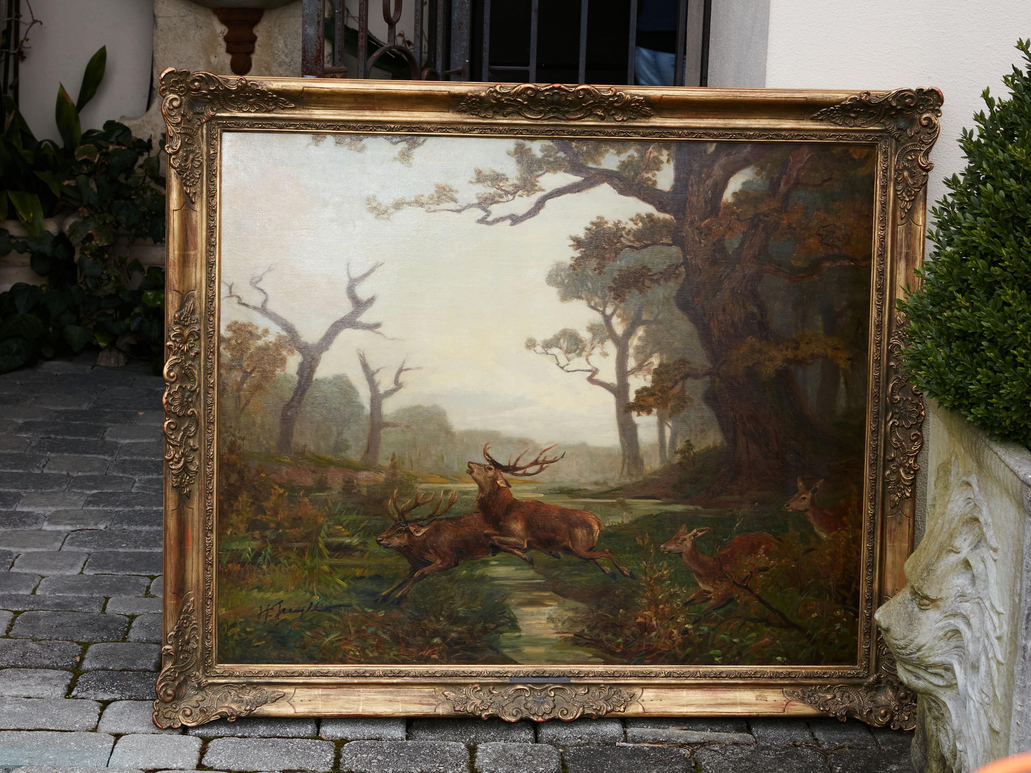 Carved Belgian Oil on Canvas Painting Depicting a Herd of Running Deer, circa 1900-1940