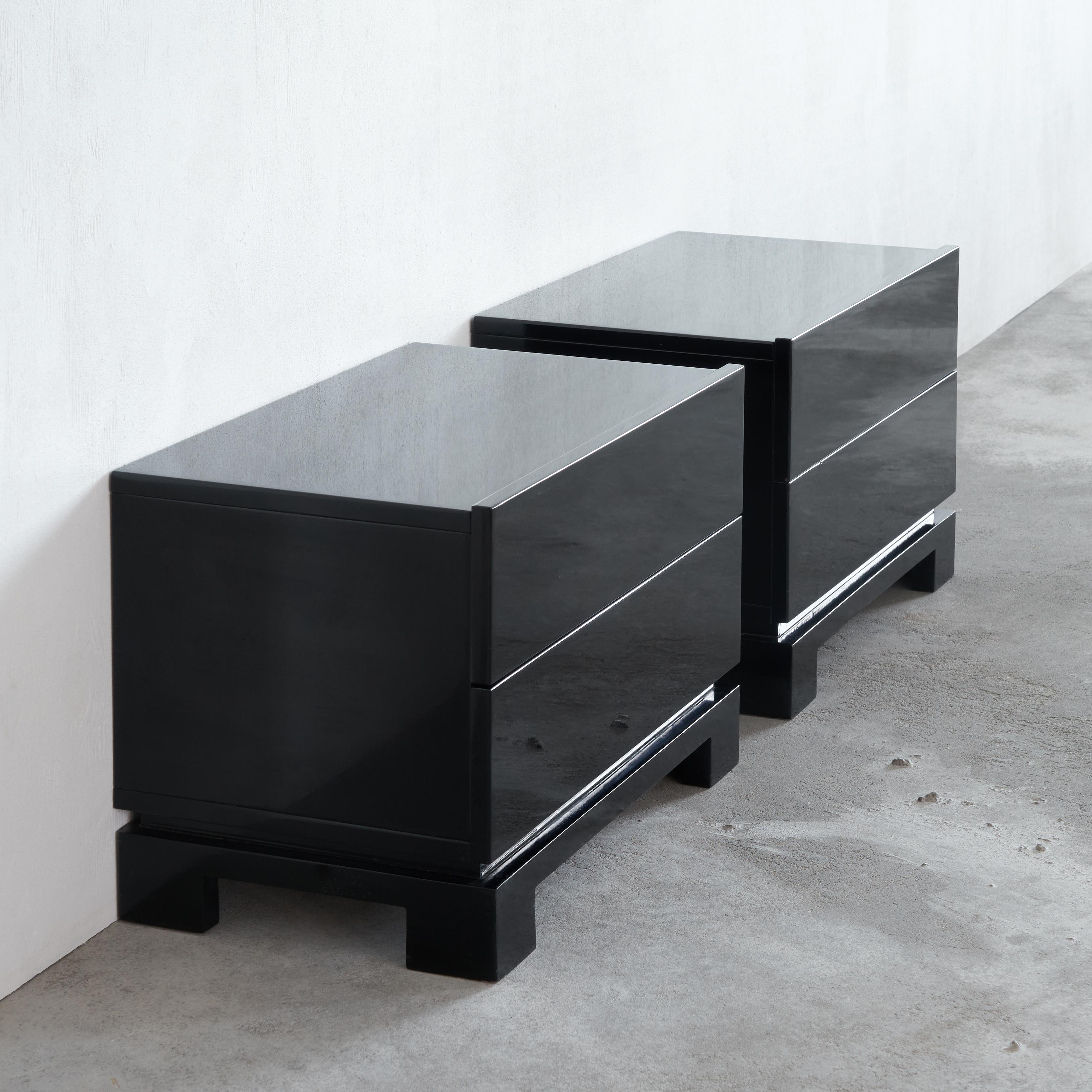 Emiel Veranneman Exquisite pair of high gloss cabinets, Belgium, 70s or 80s. 

This stylish pair of cabinets by famous Belgian designer and artist Emiel Veranneman. These cabinets have sturdy lines and perfect proportions. The lavish use of black