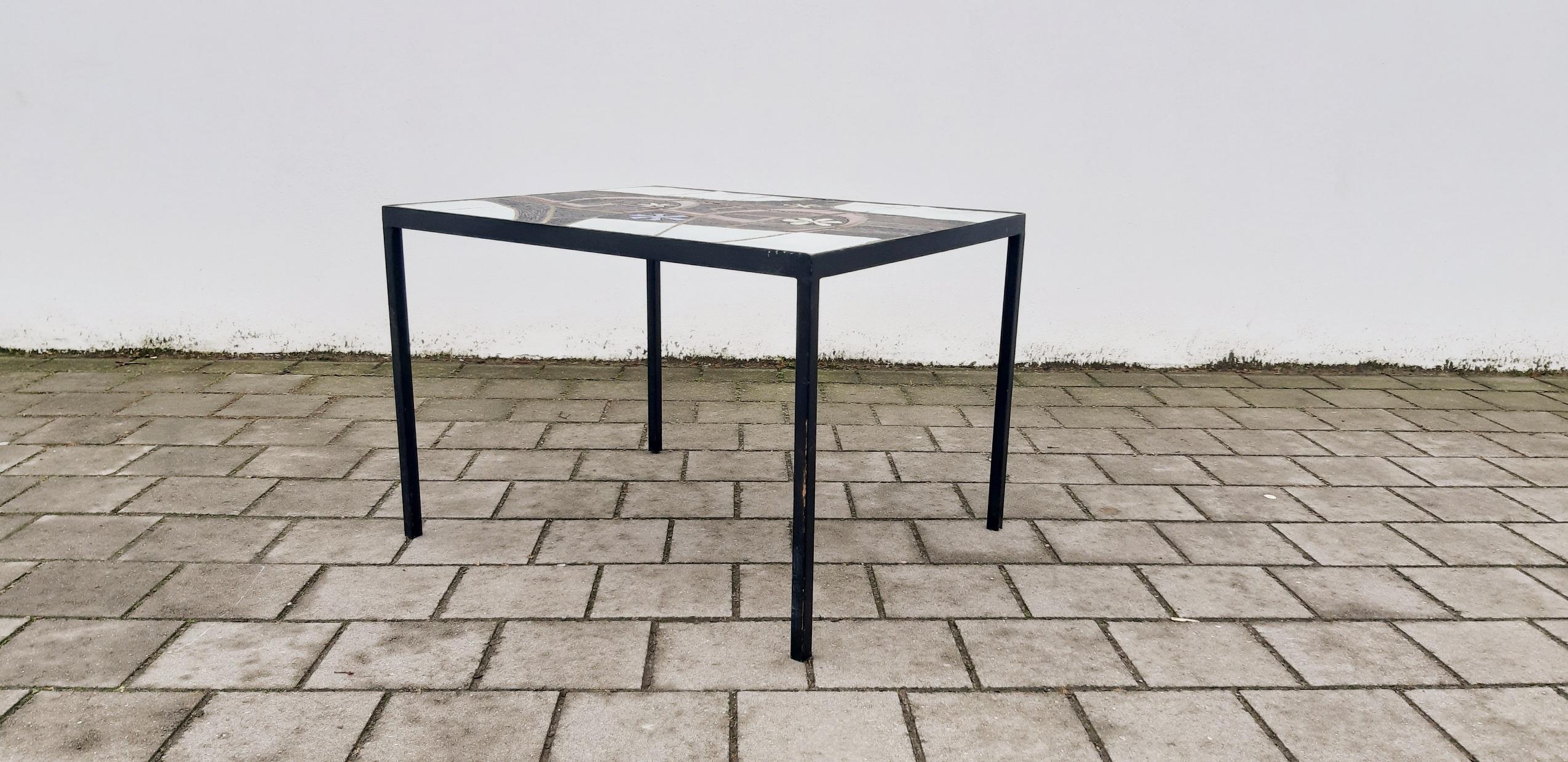 Rare midcentury coffee table dating from the 1960s, from belgian ceramist Paul Vermeire and produced by Perignem.