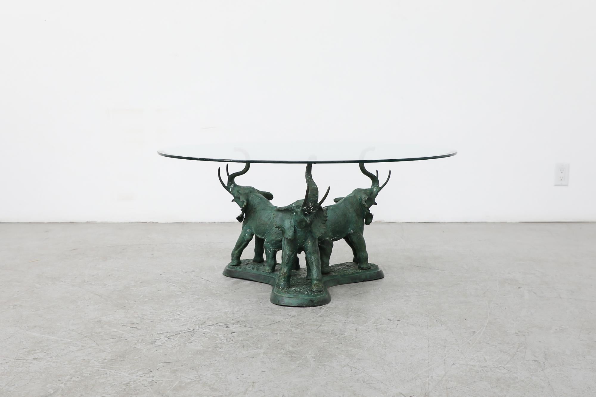 3 elephant table with glass top