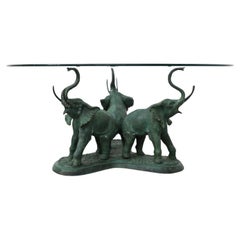 Belgian Sculptural Bronze and Glass Salon Table w/ Trio of Elephants Base, 1970s