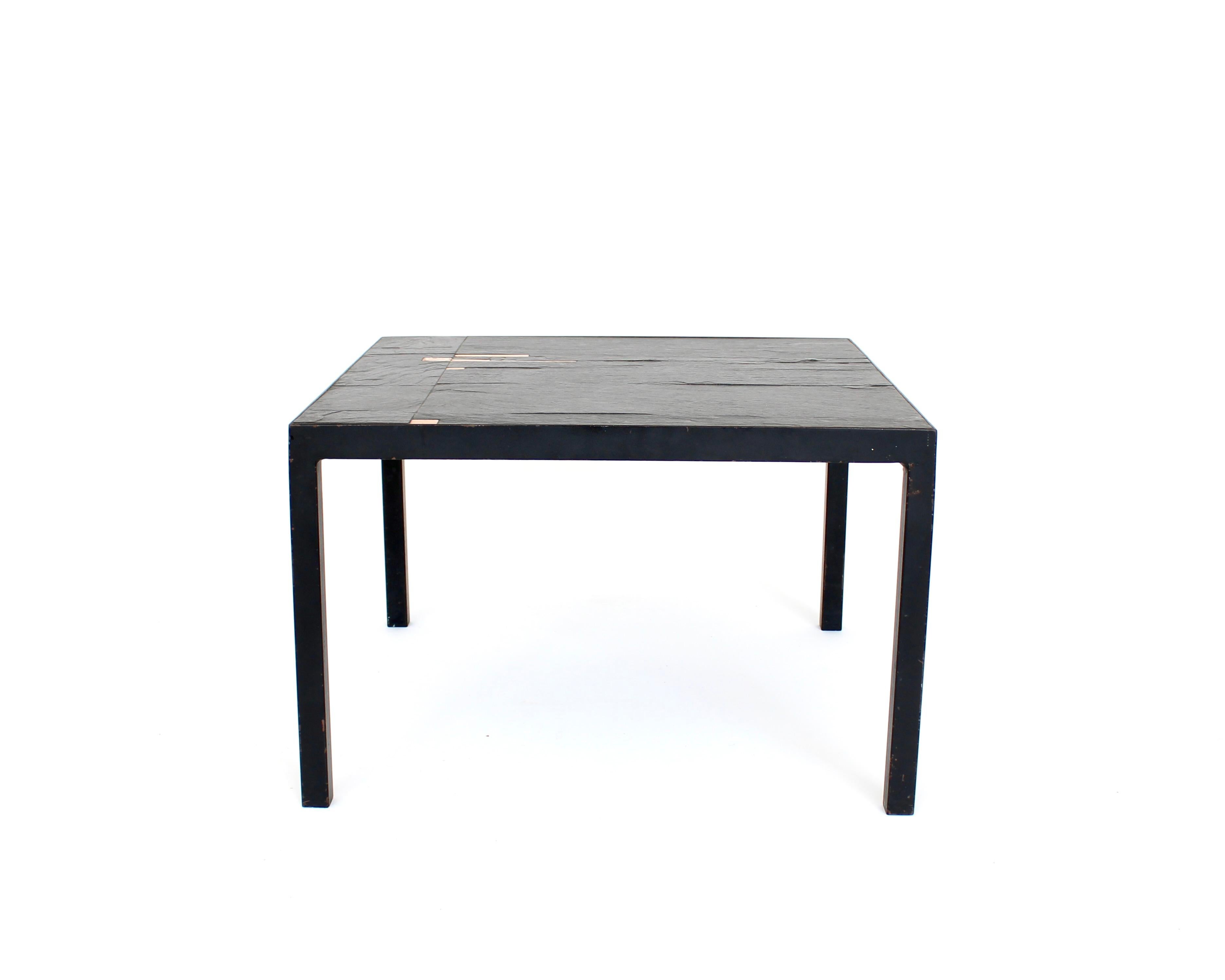 Belgian black slate and enameled ceramic side table or small coffee table attributed to Pia Manu. Bought in France. 
The black slate tiles are permanently affixed to the black painted iron frame. The small ceramic tiles are also permanently affixed