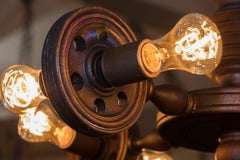 Belgian Vintage Quirky Carved Wood Chandelier with fishing reel design.