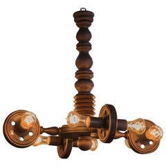 Belgian Vintage Quirky Carved Wood Chandelier with fishing reel design. 