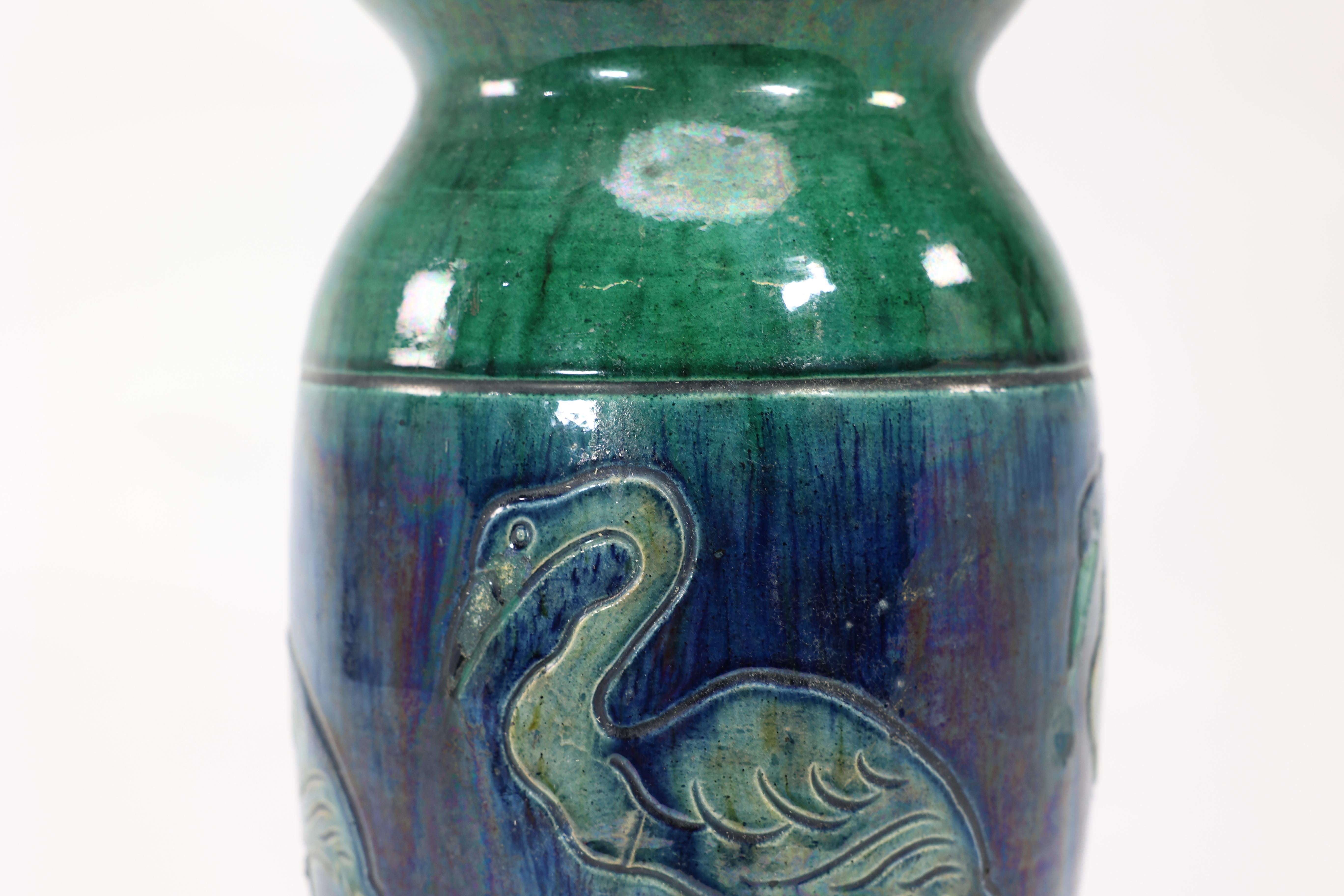 Early 20th Century Belgium Art Pottery. Tall ceramic Arts & Crafts vase decorated with 5 Flamingos. For Sale