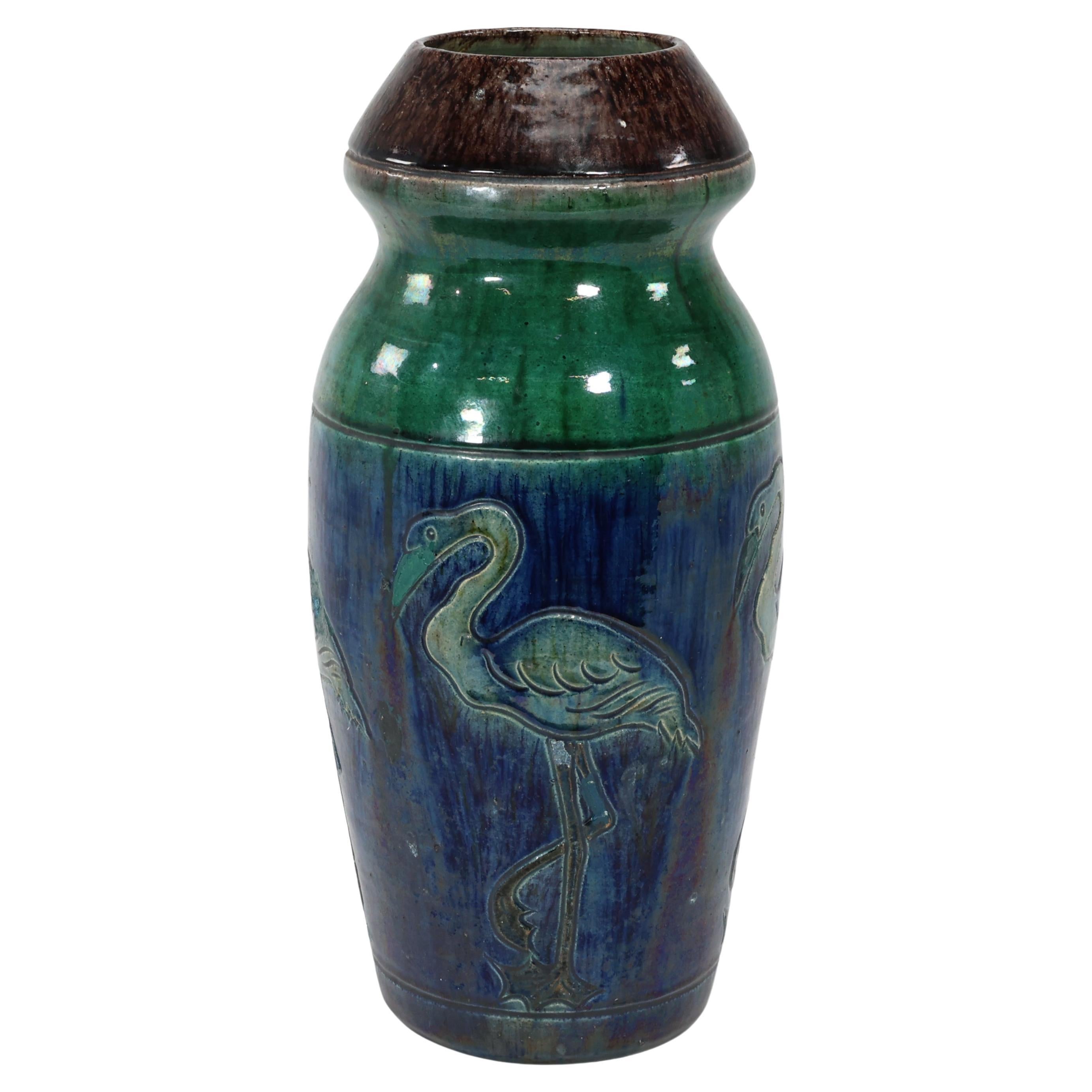 Belgium Art Pottery. Tall ceramic Arts & Crafts vase decorated with 5 Flamingos. For Sale