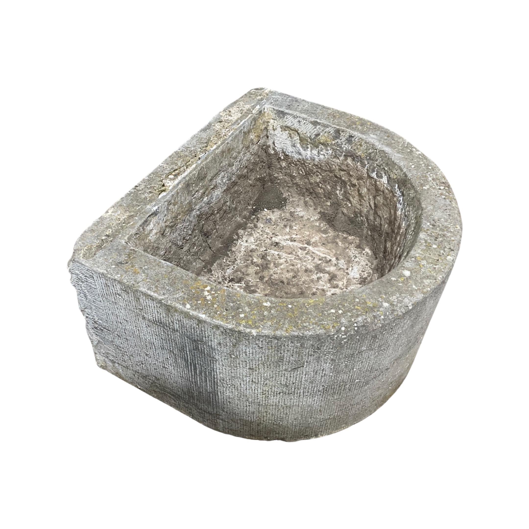 This Belgium Bluestone Sink is an incredibly rare and unique piece of art. Crafted in the 17th century, it features a half-moon shape, making it a timeless addition to any home. Its durable bluestone body is perfect for withstanding the test of