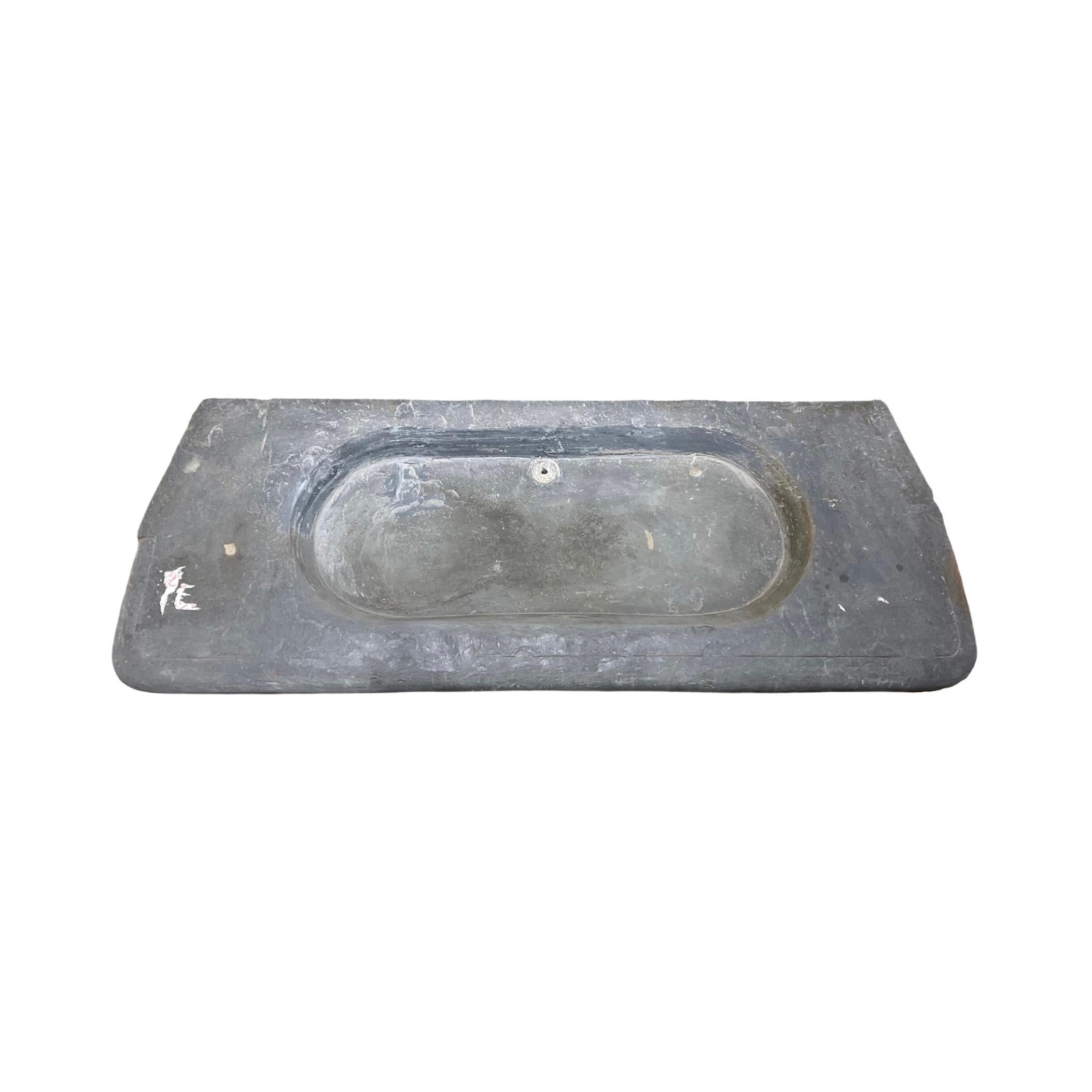 This high-quality Belgium Bluestone Sink is crafted from 17th century bluestone and adds a majestic touch to any bathroom. It comes with a large, rectangular shape and features a classic width style for a timeless feel. Experience the luxury of