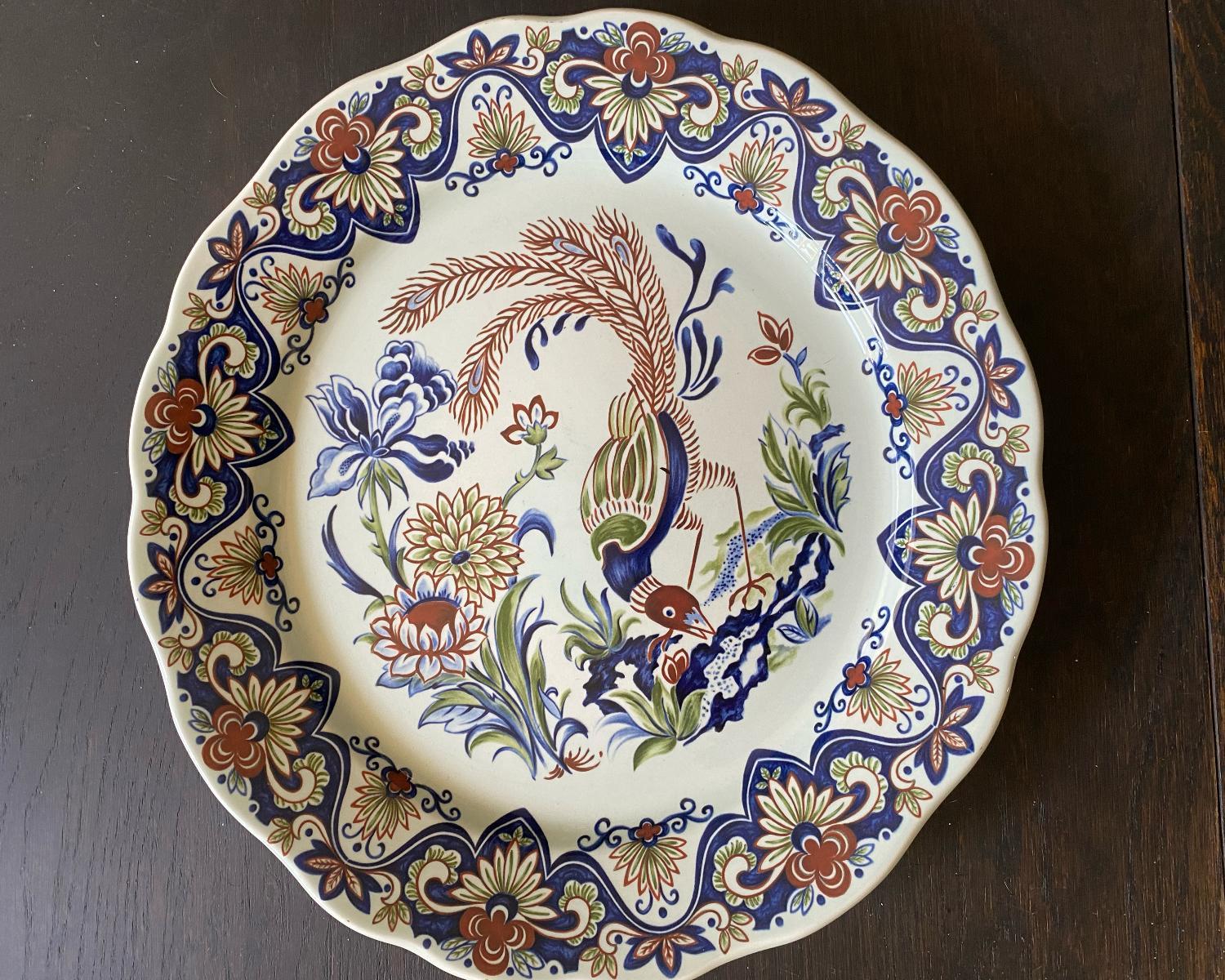 A beautiful handprinted large bowl of the Belgium Faience factory Boch. Nicely painted with a peacock and flowers. This items is in a very good condition. 
Markings Vieux Rhodes Boch Belgium.