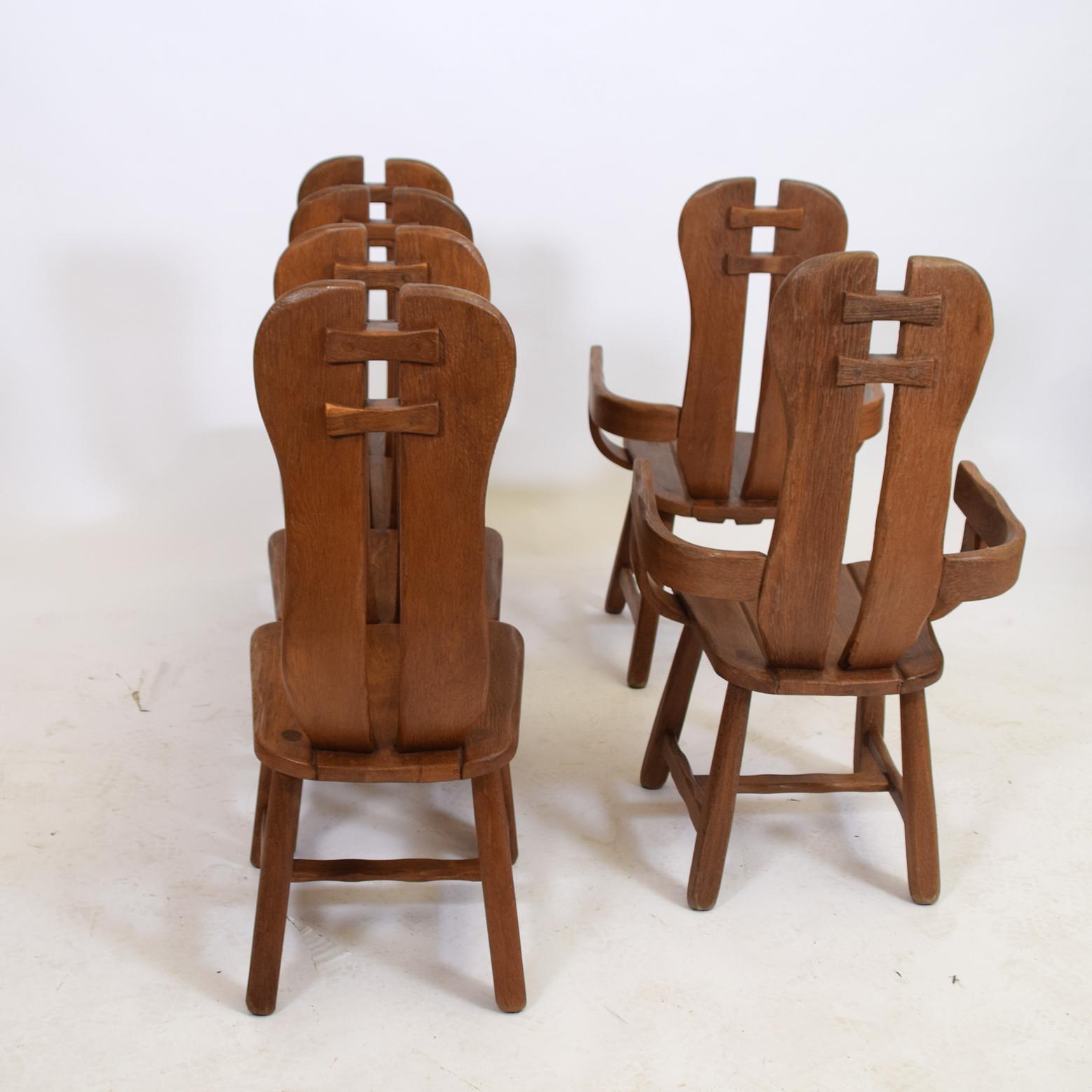 Set of 6 brutalist style oak dining chairs by designer De Puydt with tall backs, in good condition, Mid-Century Modern.