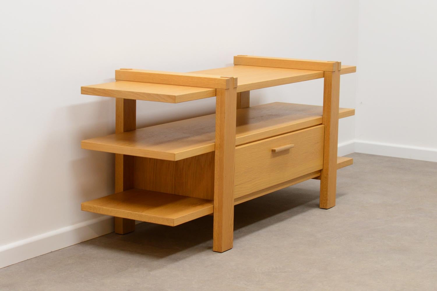 Belgium oak shelving unit. Made of a combination of Solid and thick veneer oak. Free standing with large drawer.