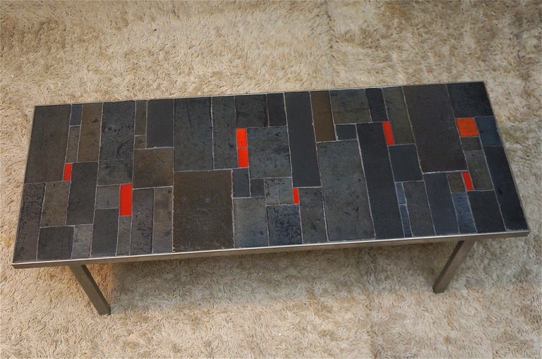 Belgium tile top and iron coffee table by Pia Manu, 1960.