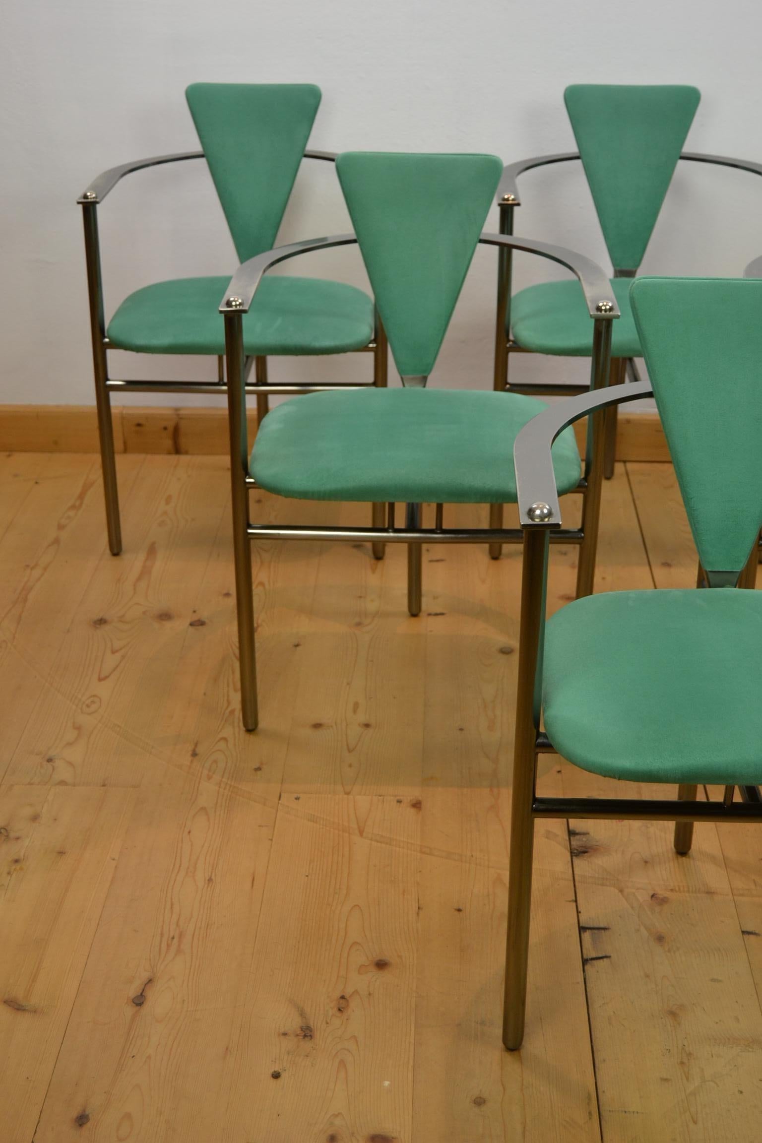 Set of 6 steel chairs by Belgo Chrome Belgium from the late 1970s. These Memphis style armchairs still have their original upholstery in Green Alcantara.

The green seatings are in used condition with some little spots, also the stainless steel