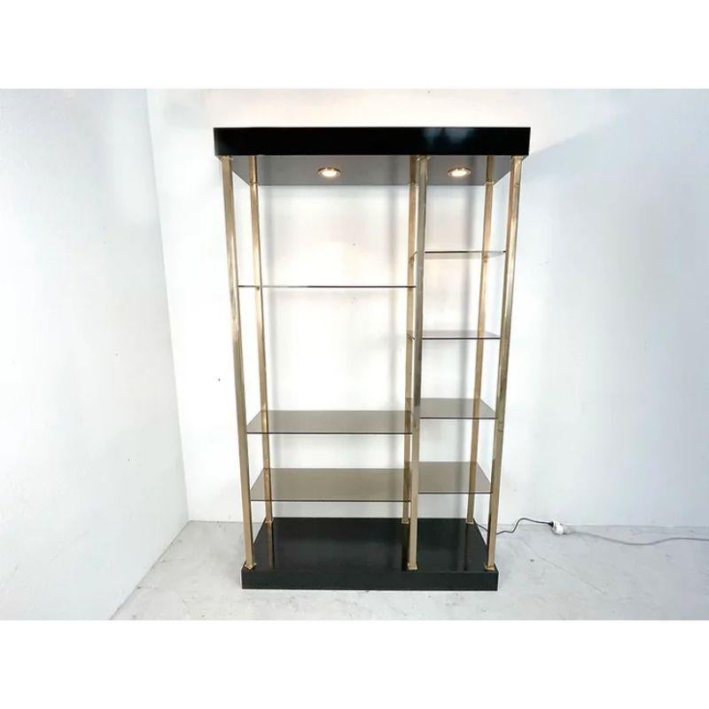 Belgo chrome Etagere in smoked glass shelving and brass.

Belgian etagère manufactered by Belgo Chrome. The etagerère features smoked glass shelving and brass details. The etagère is in good condition. 

Measurements: W 117 x D 36 x H 201 cm.