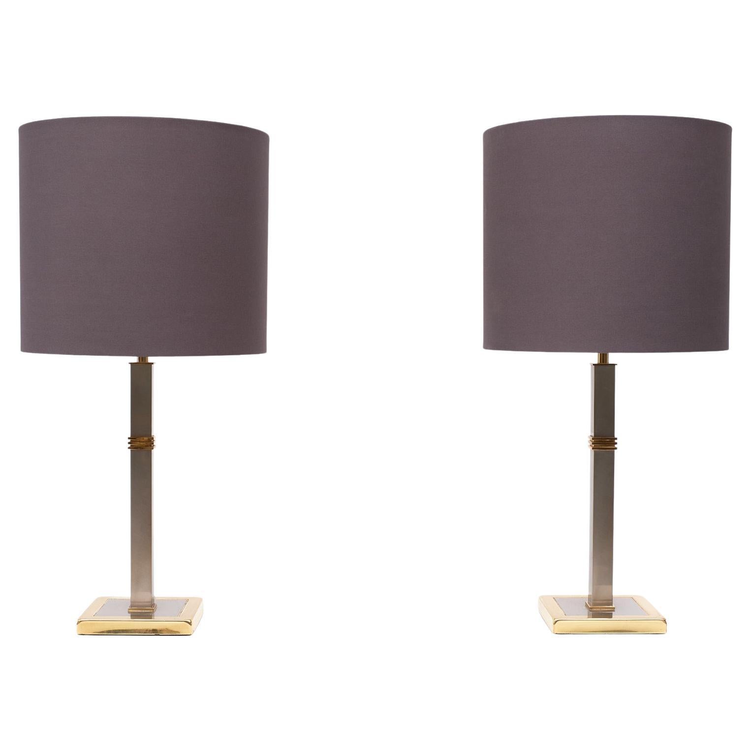 Very nice set of table lamps, brushed steel with Brass Details . one large E27 bulb needed 
Belgo Chrome .1970s Belgium, comes with new good matching shades .

Please don't hesitate to reach out for alternative shipping quote

  
