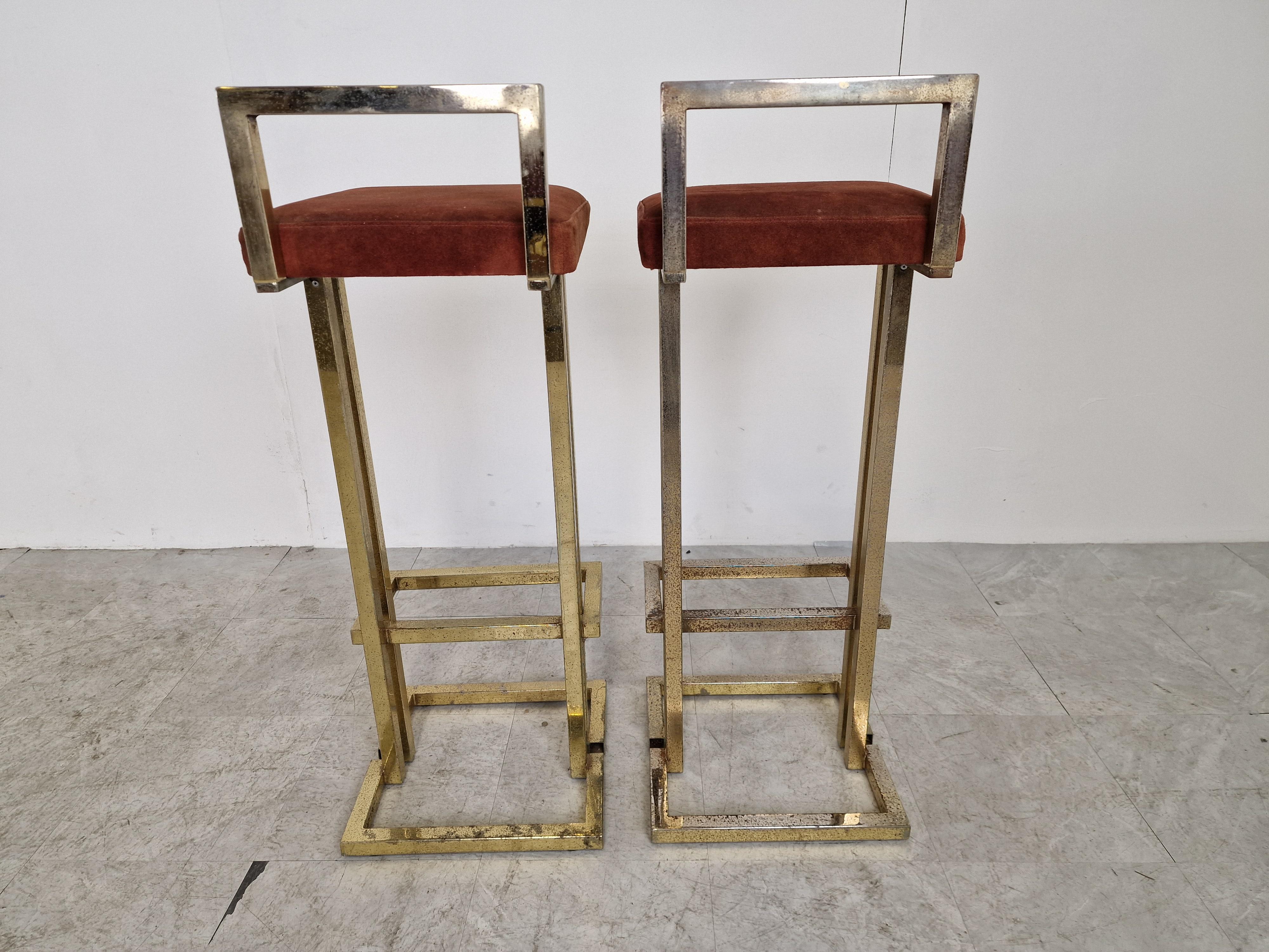 Beautiful original brass and suede bar stools by Belgochrom.

Beautiful timeless design with a luxury appeal.

They have their original brown suede upholstery.

Good overall condition. Frame has some patina/wear but still looks great.

1970s