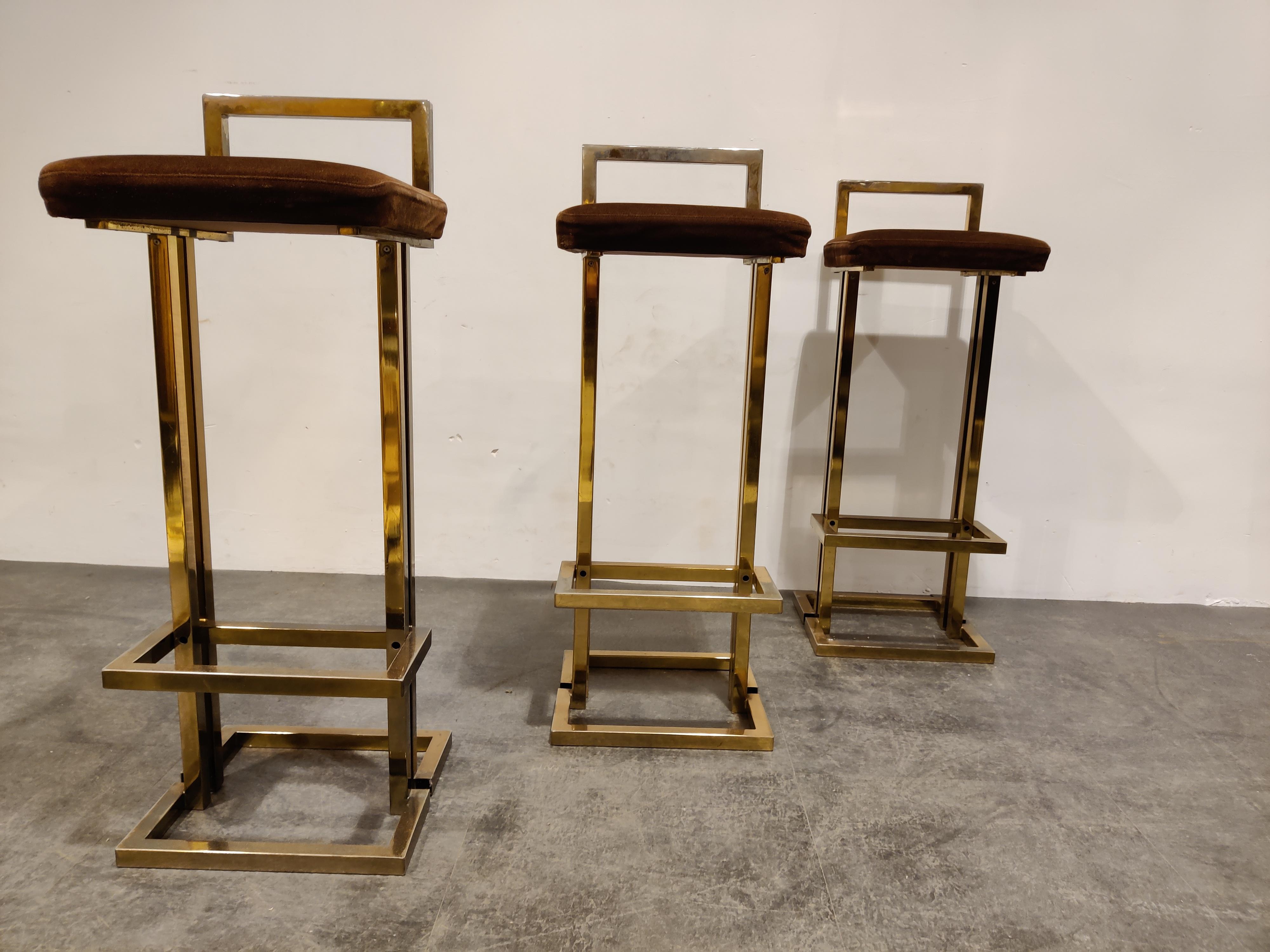 Beautiful original brass and suede bar stools by Belgochrom.

Beautiful timeless design with a luxury appeal.

They have their original brown suede upholstery which mixes well with the brass frame.

Good overall condition. Upholstery is very