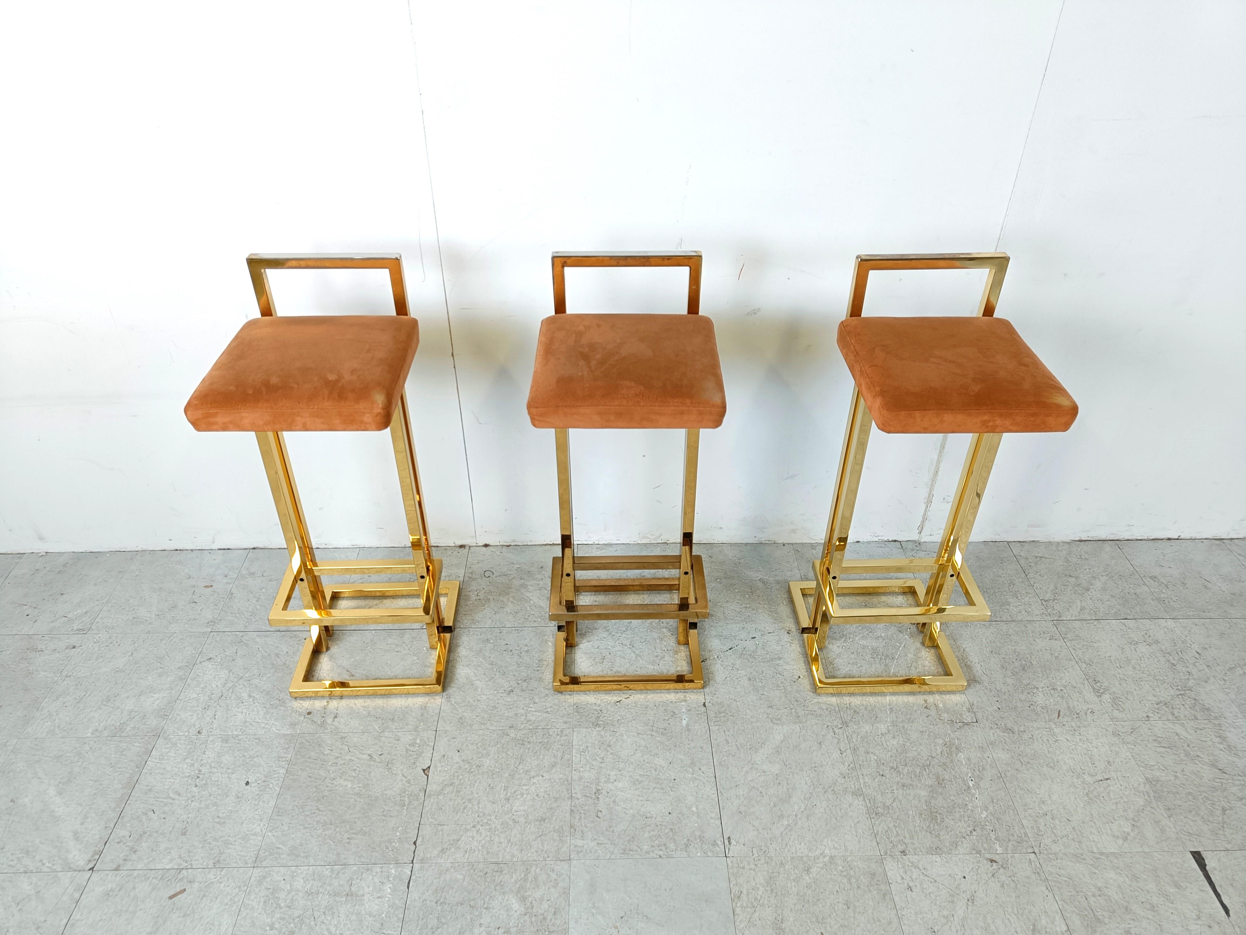 Beautiful original brass and suede bar stools by Belgochrom.

Beautiful timeless design with a luxury appeal.

They have their original brown suede upholstery which mixes well with the brass frame.

Good overall condition. Upholstery is very good,