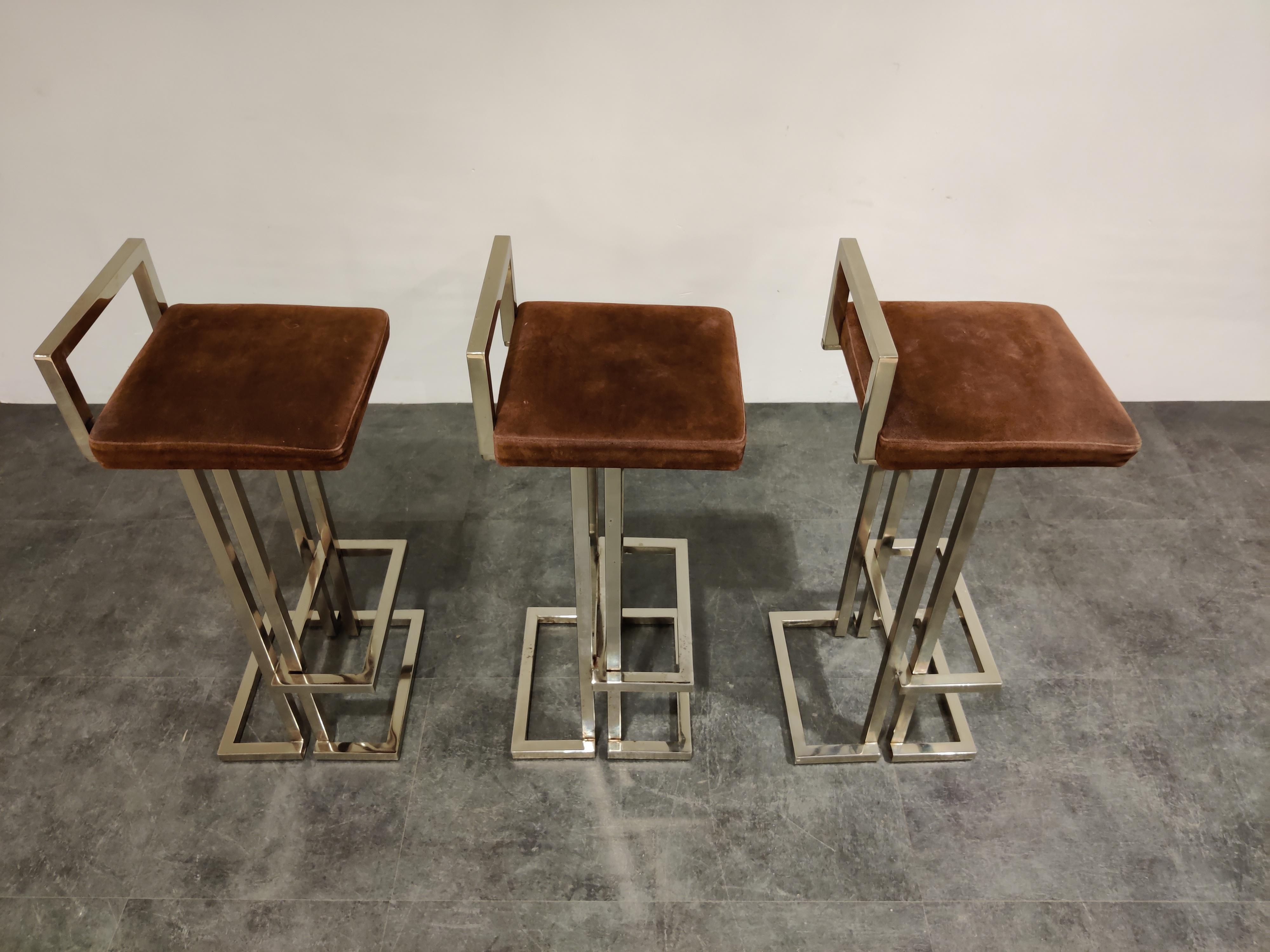 Beautiful original chrome and suede bar stools by Belgochrom.

Beautiful timeless design with a luxury appeal.

They have their original brown suede upholstery which mixes well with the chrome frame.

The chrome has been polished, although it